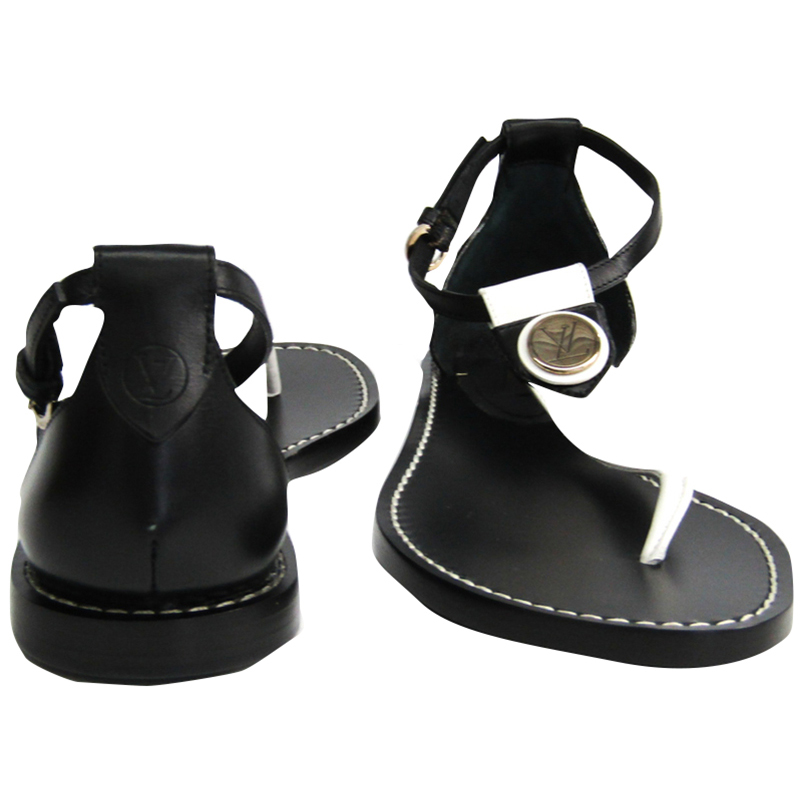 

Louis Vuitton Black/White Leather Flat Sandals Size