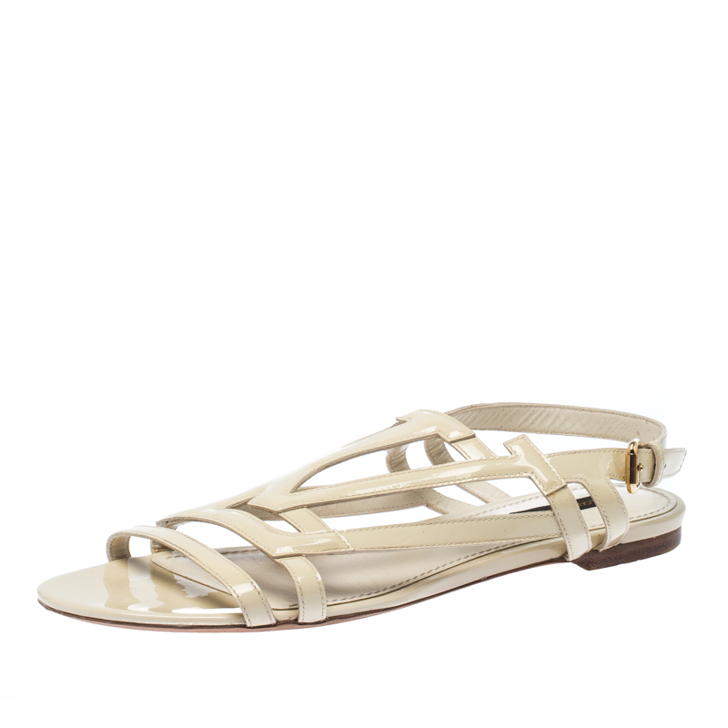 مملوكة مسبقًا Louis Vuitton Cream Patent Leather Crossing Logo Flat Sandals Size 40
