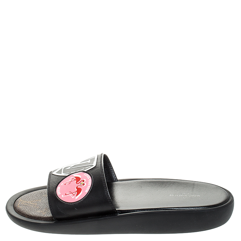 

Louis Vuitton Black Leather LV Flamingo Flat Slides Size