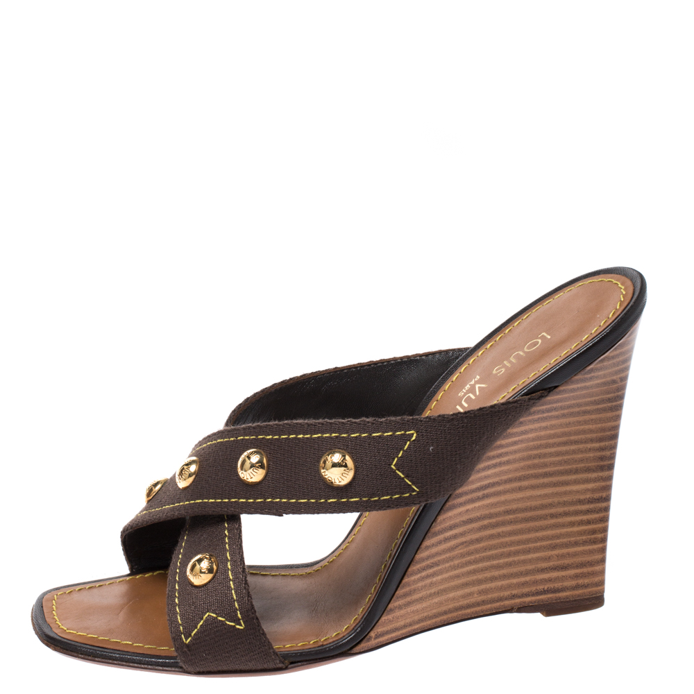

Louis Vuitton Brown Canvas Studded Wedge Cross Strap Sandals Size