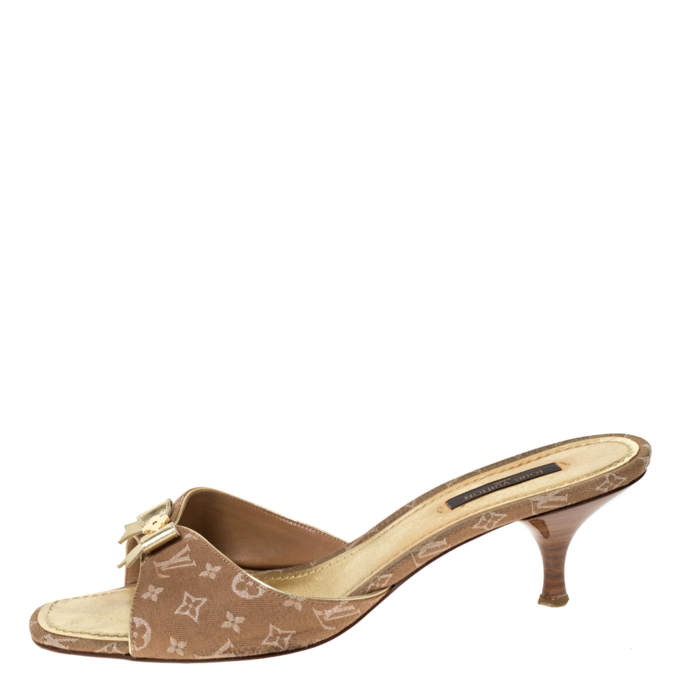 

Louis Vuitton Brown Mini Lin Canvas Bow Slide Sandals Size