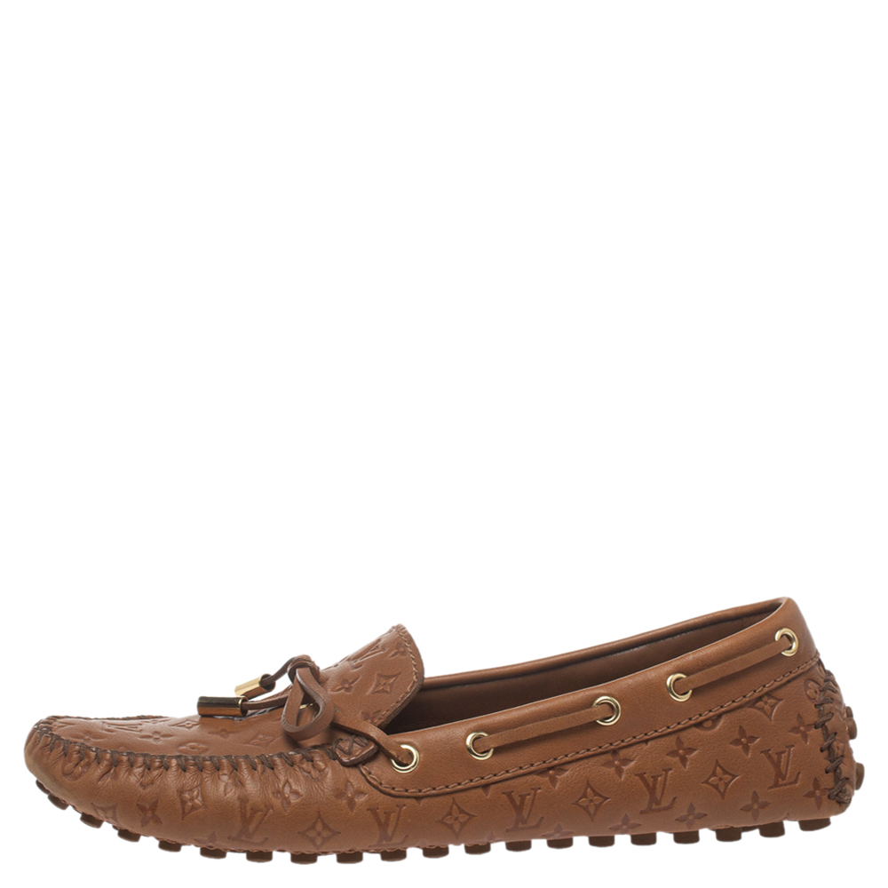 

Louis Vuitton Brown Monogram Empreinte Leather Gloria Slip On Loafers Size