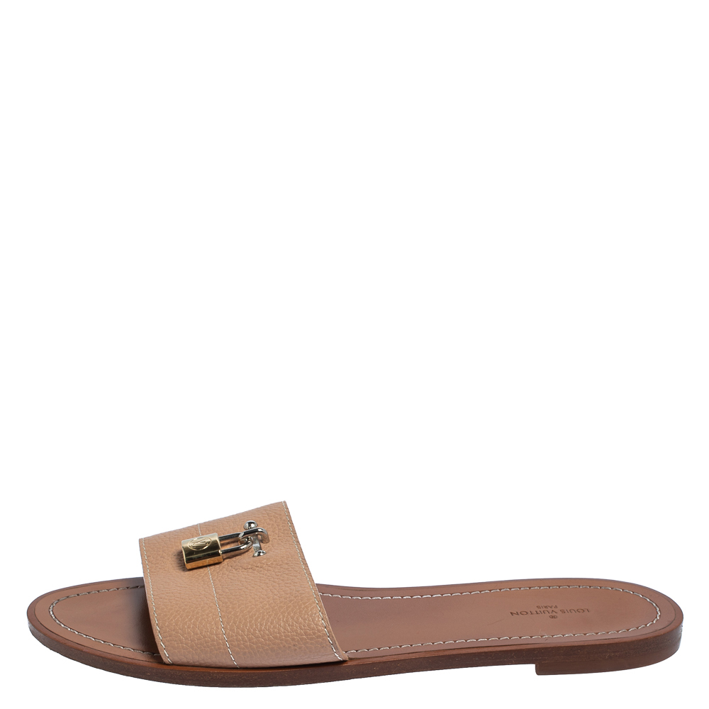 

Louis Vuitton Beige Leather Lock Flats Sandals Size
