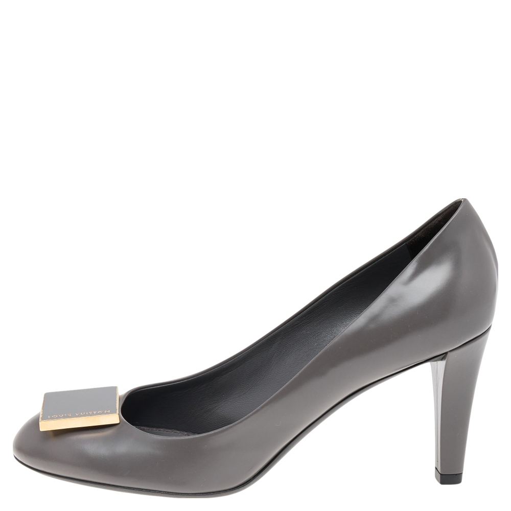 

Louis Vuitton Grey Leather Metal Logo Embellished Pumps Size