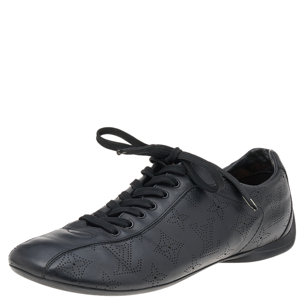 Made to provide comfort these sneakers by Louis Vuitton are perfect for all seasons. Theyve been crafted from monogram perforated leather and designed with simple lace up vamps.