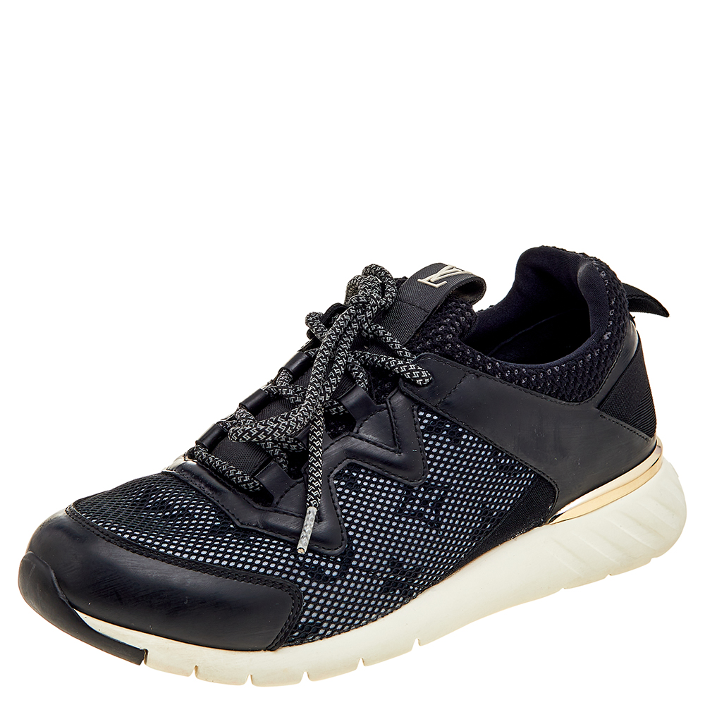 The House of Louis Vuitton brings class and luxury to your outfit with these sneakers. They are made from black leather and mesh into a low top silhouette. They flaunt lace up on the vamps and tough rubber soles. Get these stunning LV sneakers today and update your designer collection