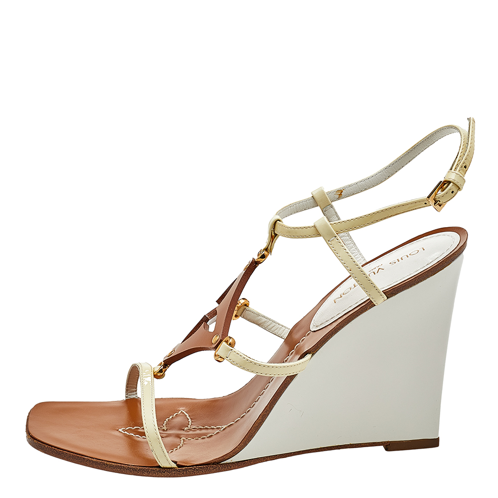 

Louis Vuitton Brown/Beige Patent And Leather Capricieuse Monogram Wedge Sandals Size