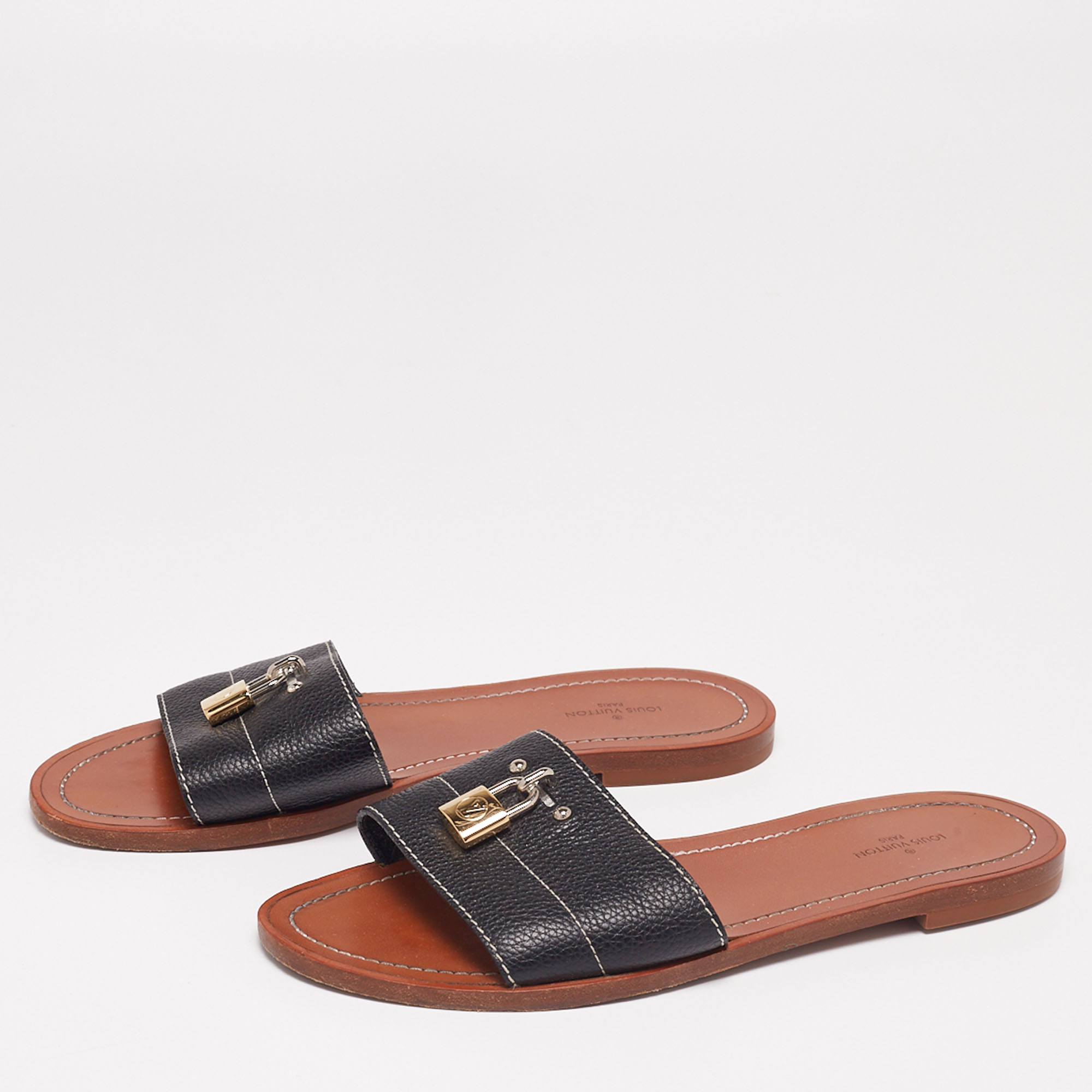 

Louis Vuitton Black Leather Lock It Flat Sandals Size