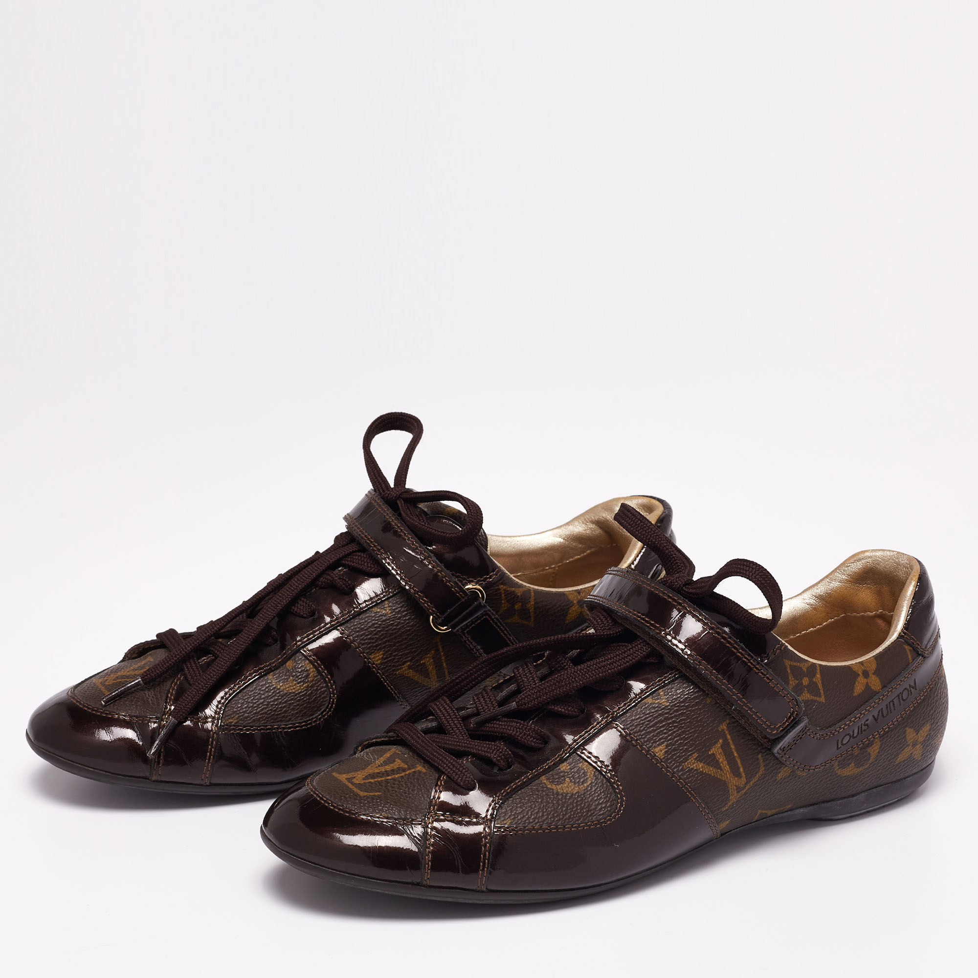 

Louis Vuitton Brown Patent Leather And Monogram Canvas Lace Up Sneakers Size