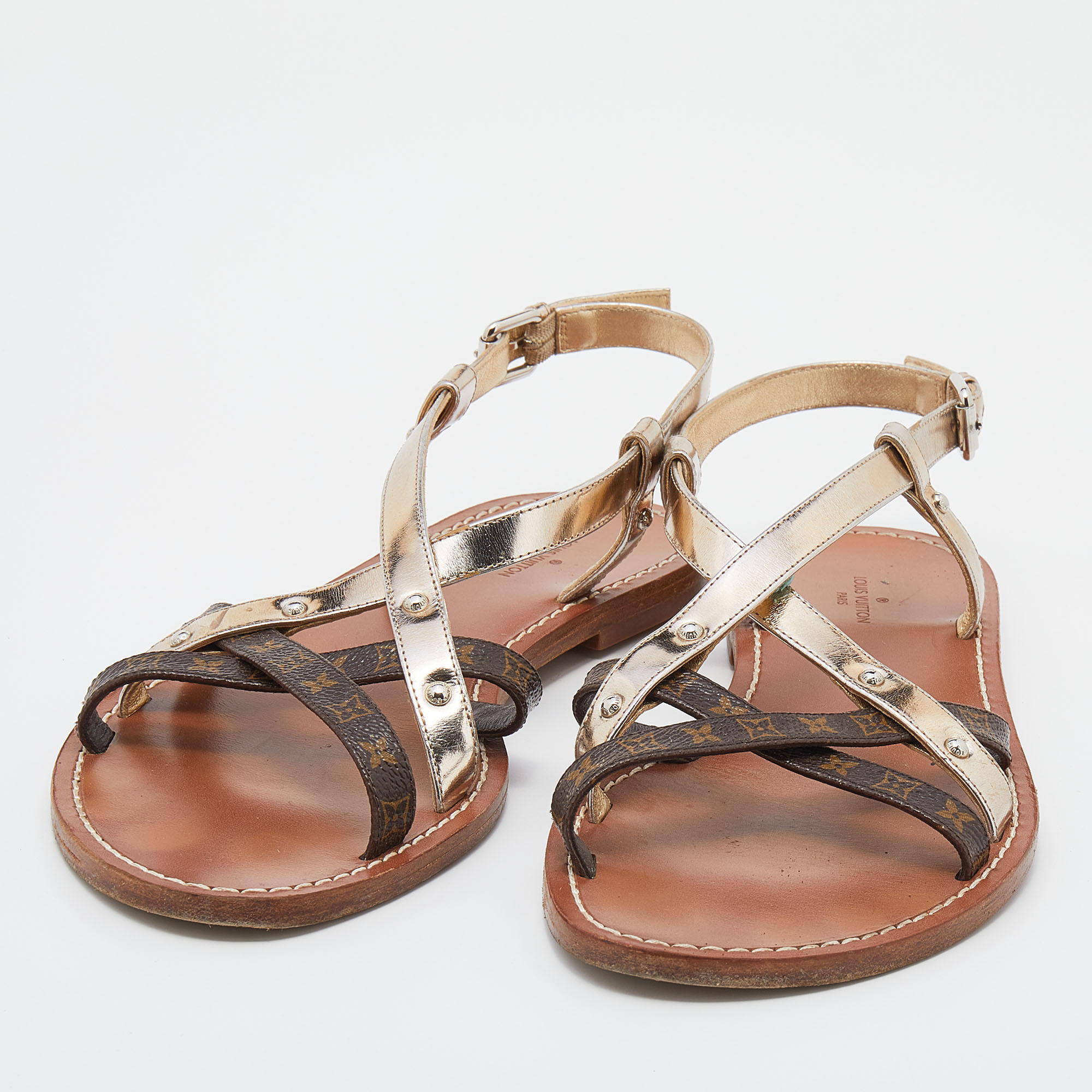 

Louis Vuitton Metallic Gold/Brown Leather And Monogram Canvas Strappy Flat Sandals Size