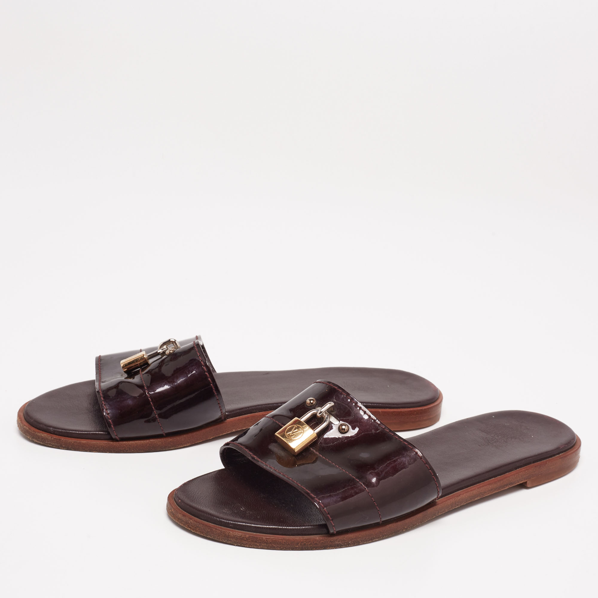

Louis Vuitton Burgundy Patent Leather Lock it Flat Sandals Size