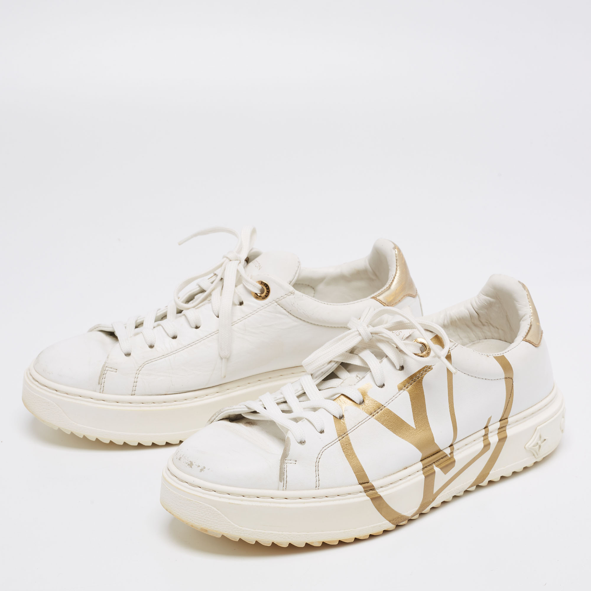 

Louis Vuitton White/Gold Leather Time Out Low-Top Sneakers Size