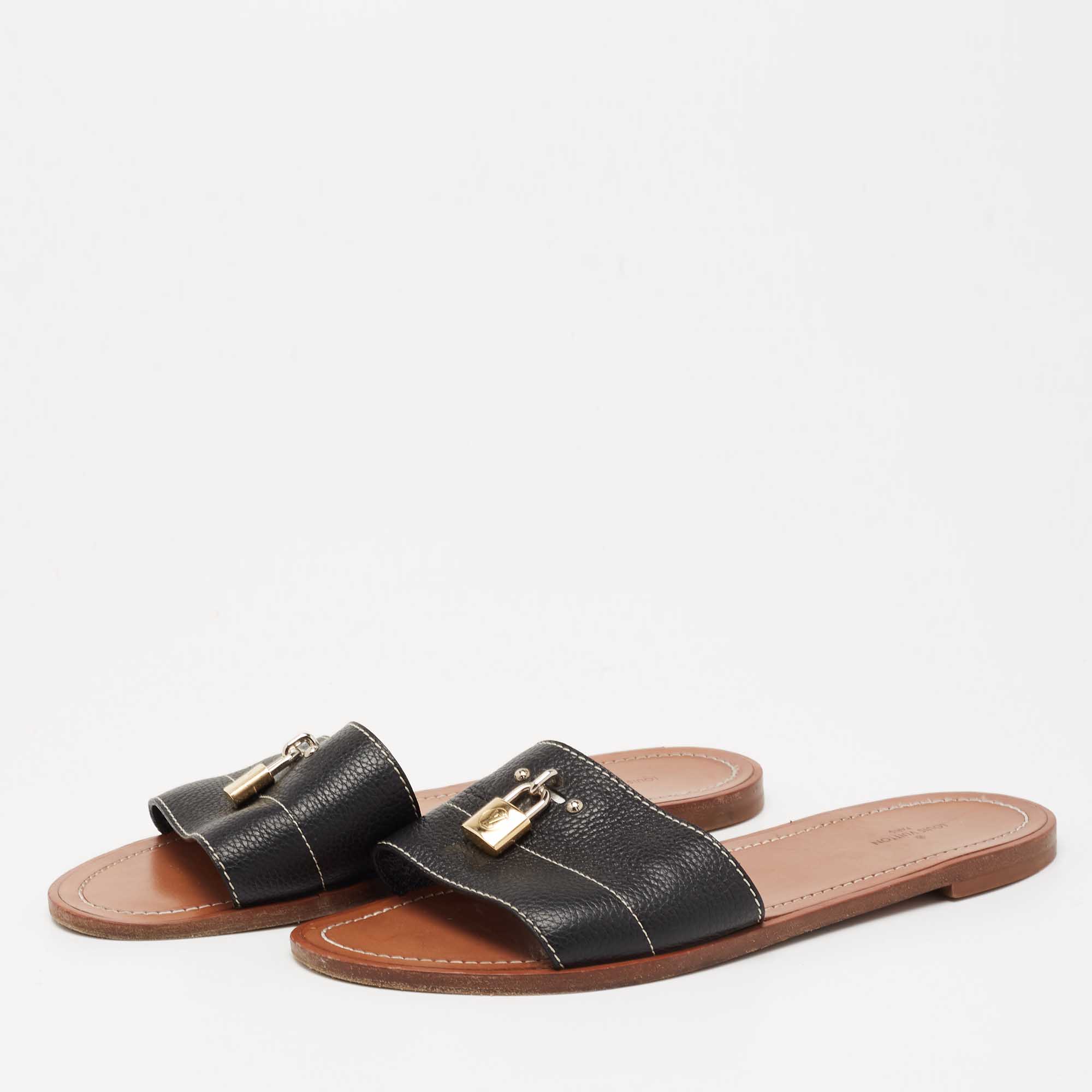 

Louis Vuitton Black Leather Lock it Flat Slides Size