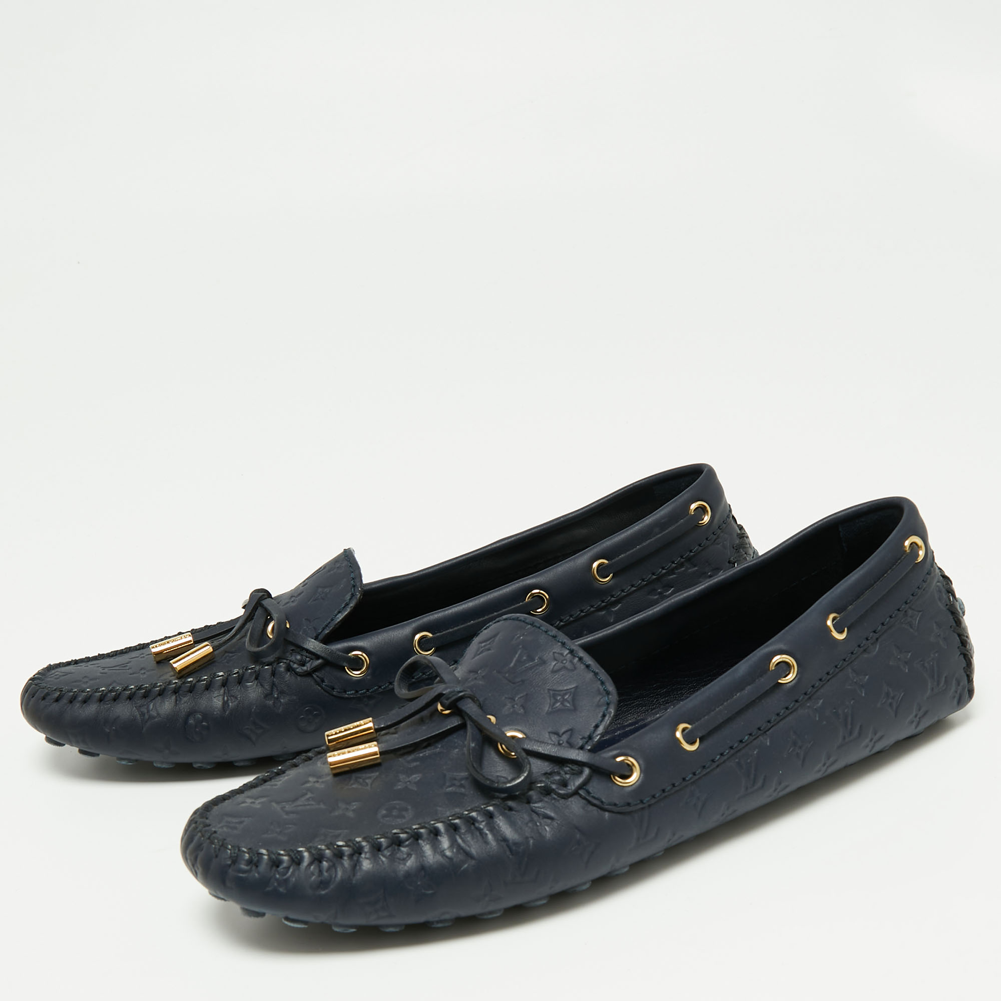 

Louis Vuitton Navy Blue Monogram Empreinte Leather Gloria Loafers Size