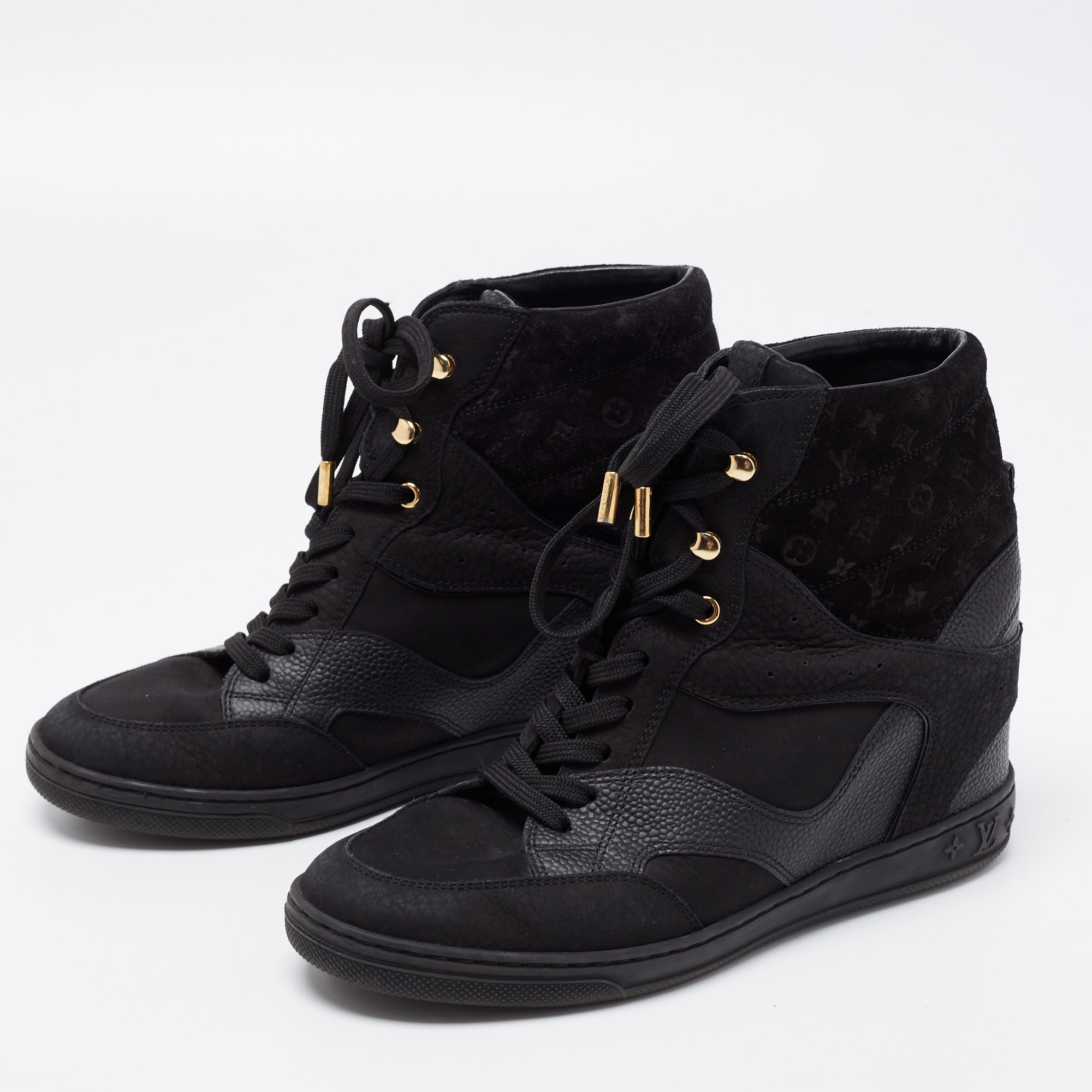 

Louis Vuitton Black Monogram Empreinte Suede and Leather High-Top Sneakers Size