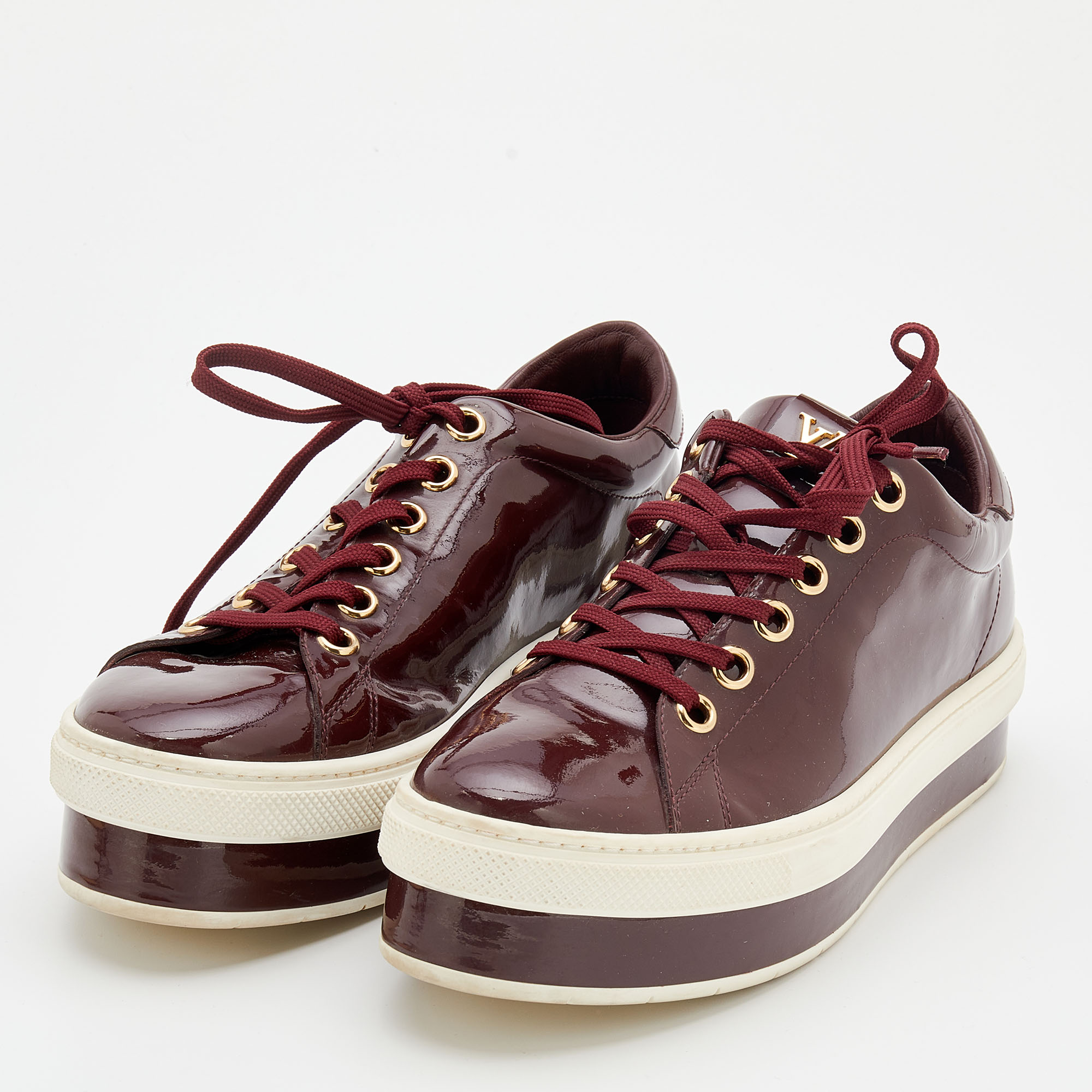 

Louis Vuitton Burgundy Patent Leather Lace Up Platform Sneakers Size