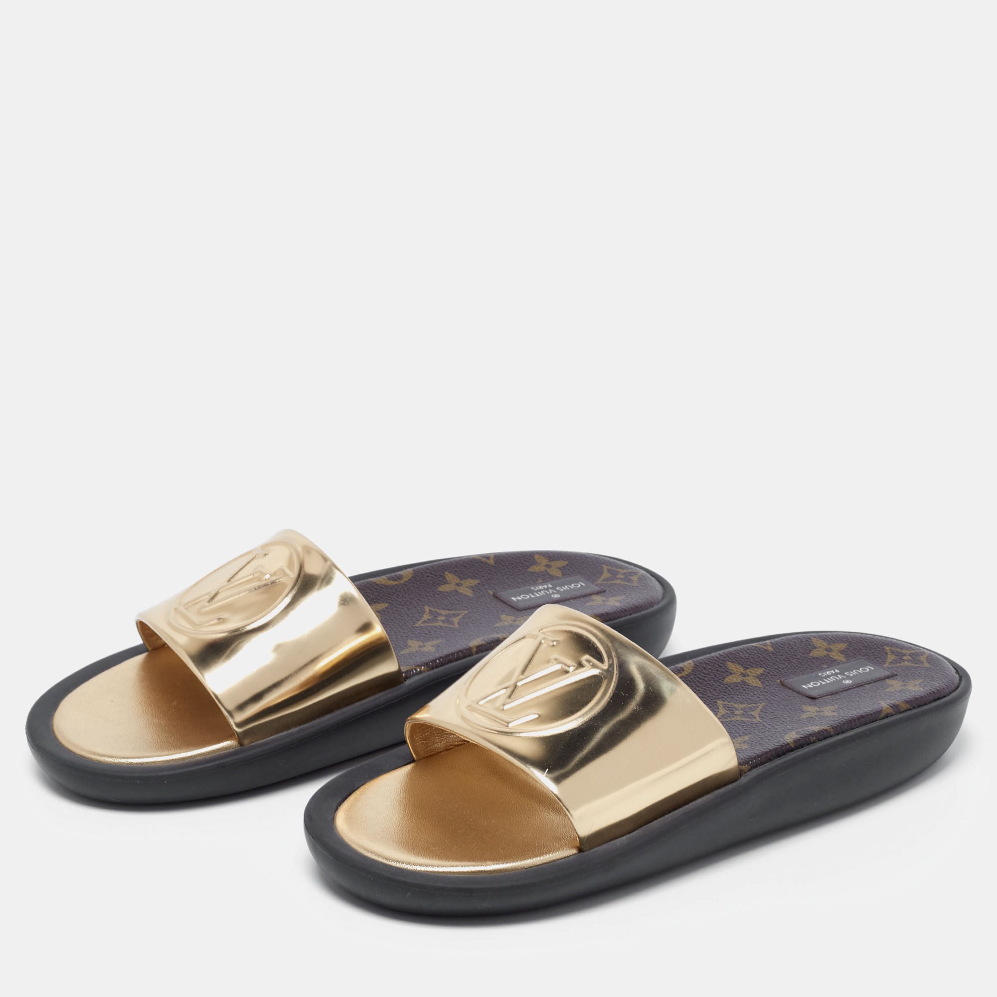 

Louis Vuitton Gold Leather Sunbath Flat Slides Size