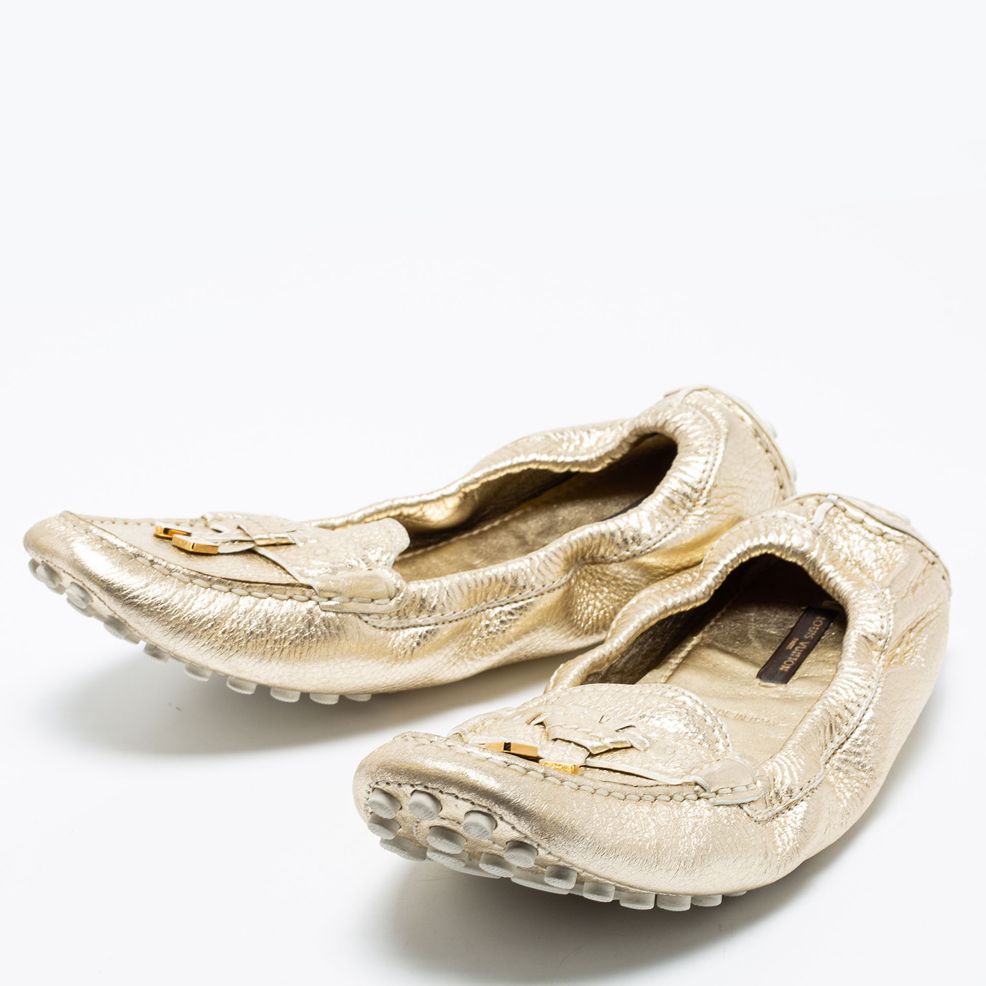 

Louis Vuitton Metallic Gold Leather Bow Scrunch Slip On Loafers Size