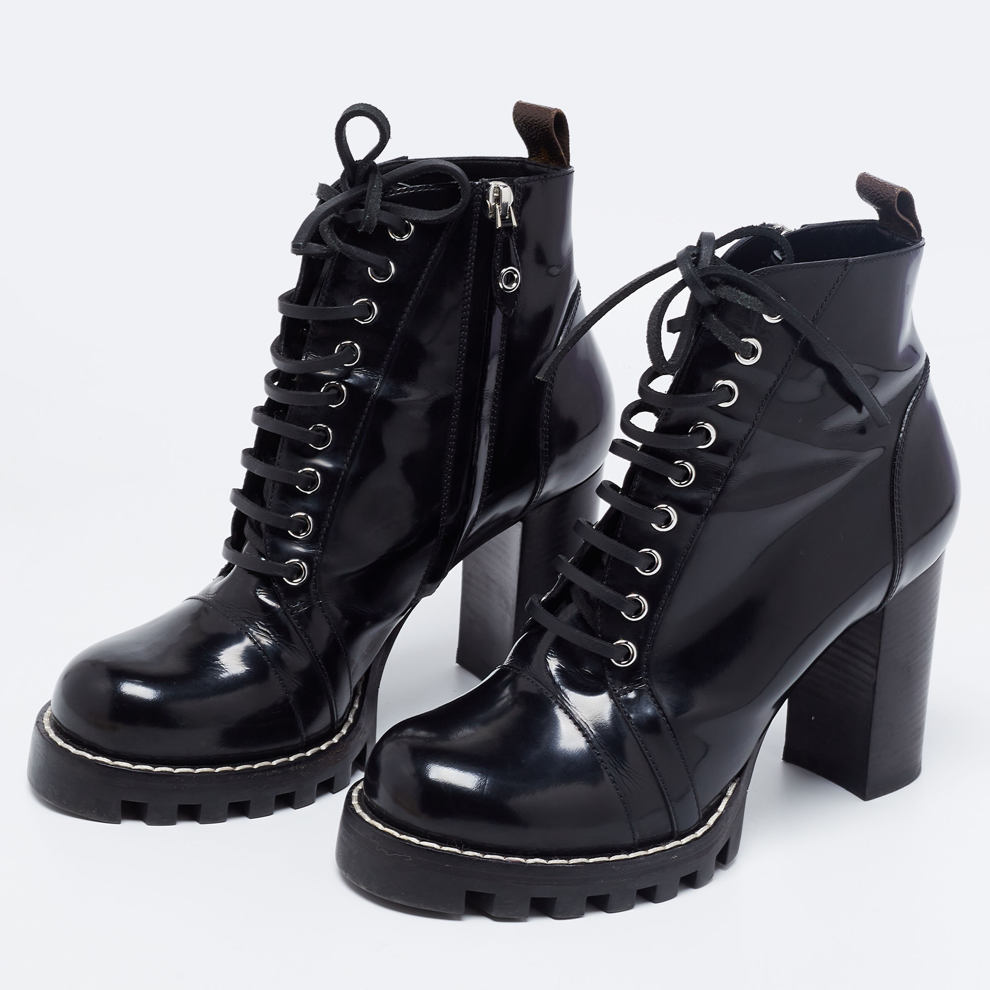 

Louis Vuitton Black Patent Leather Star Trail Block Heel Boots Size