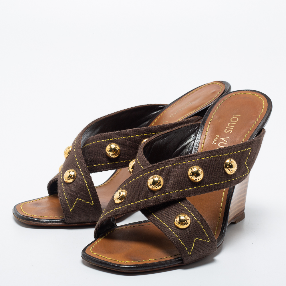 

Louis Vuitton Brown Studded Canvas Cross Strap Wedge Sandals Size
