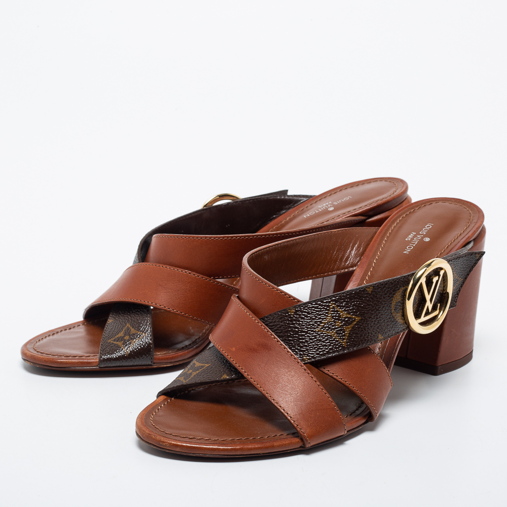 

Louis Vuitton Brown Monogram Canvas and Leather Horizon Slide Size