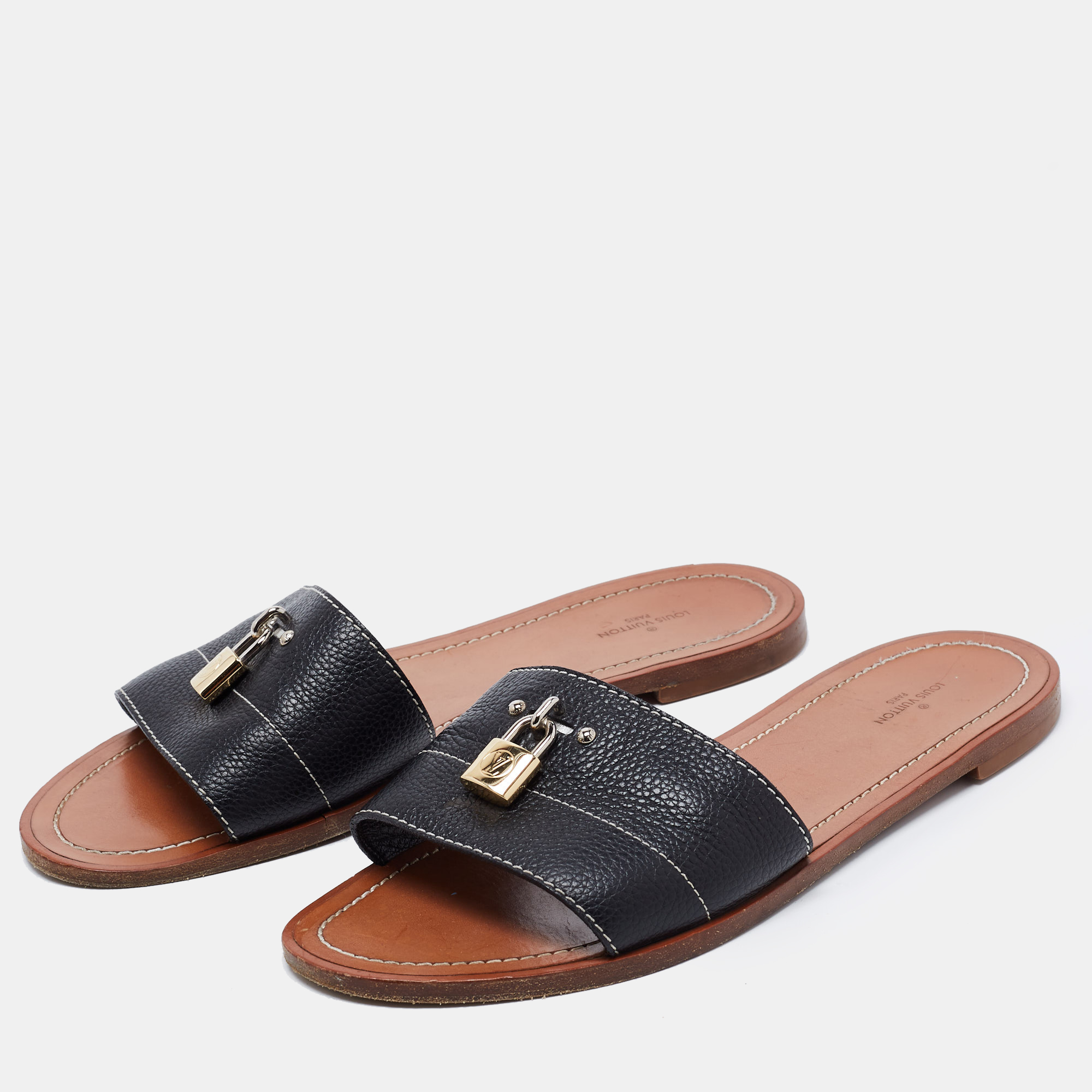 

Louis Vuitton Black Leather Lock It Slides Size