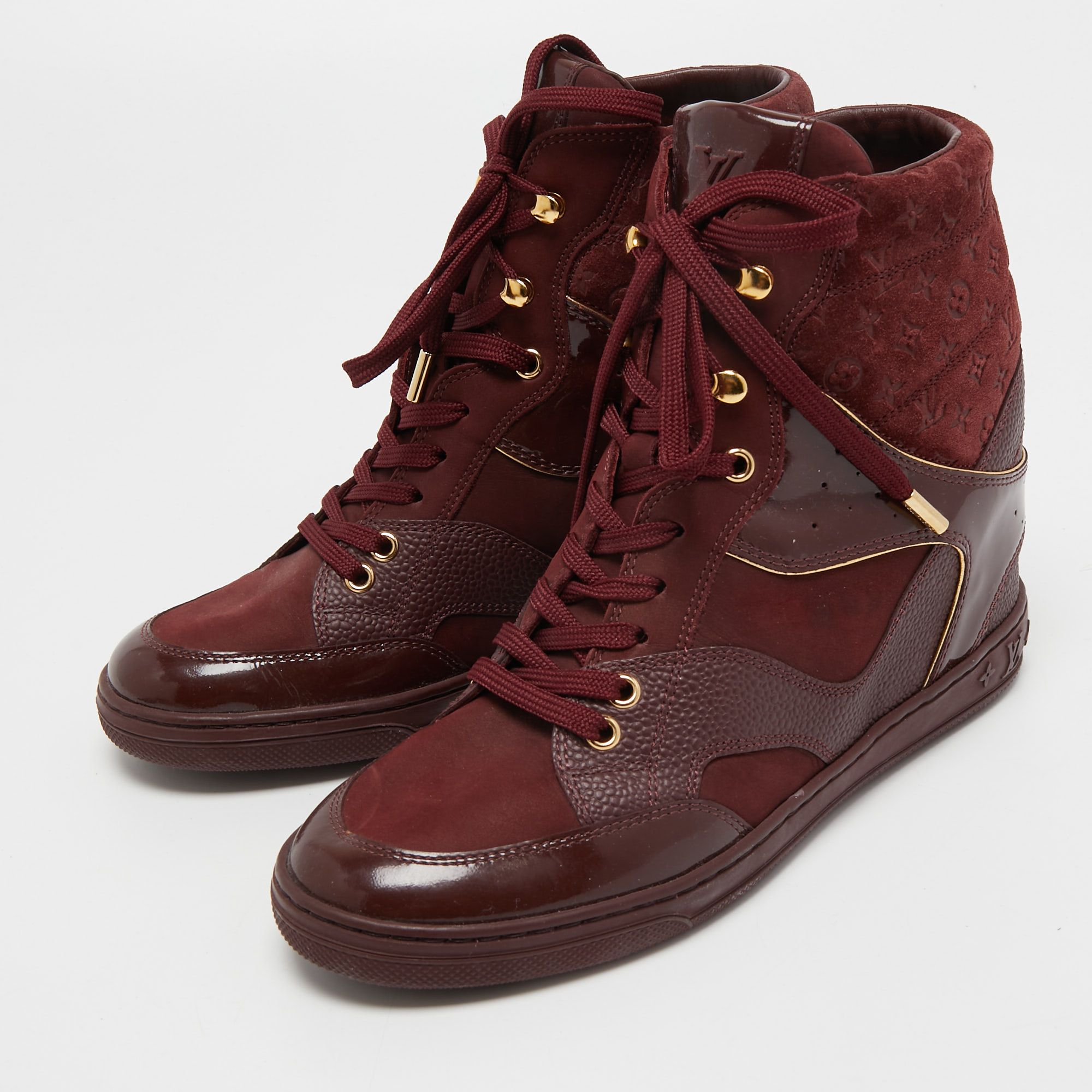 

Louis Vuitton Burgundy Leather and Embossed Monogram Suede Millenium High Top Sneakers Size