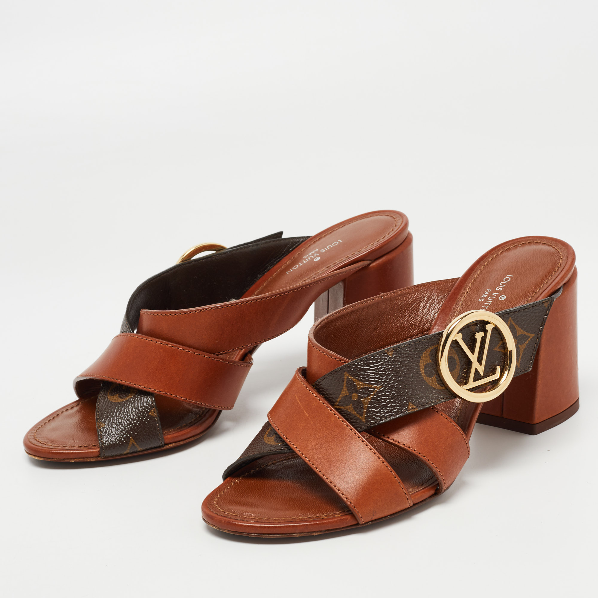 

Louis Vuitton Brown Leather and Monogram Canvas Slide Sandals Size