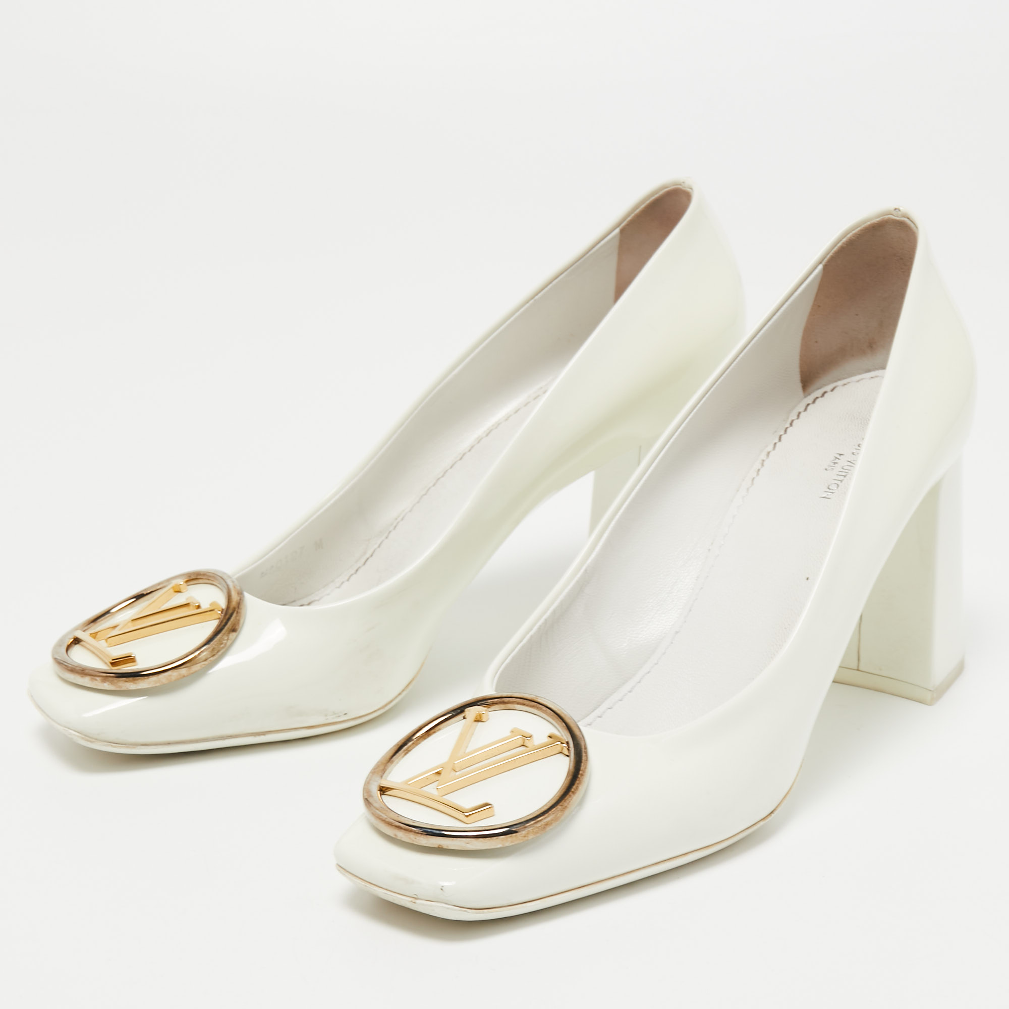 

Louis Vuitton White Patent Leather Madeleine Pumps Size