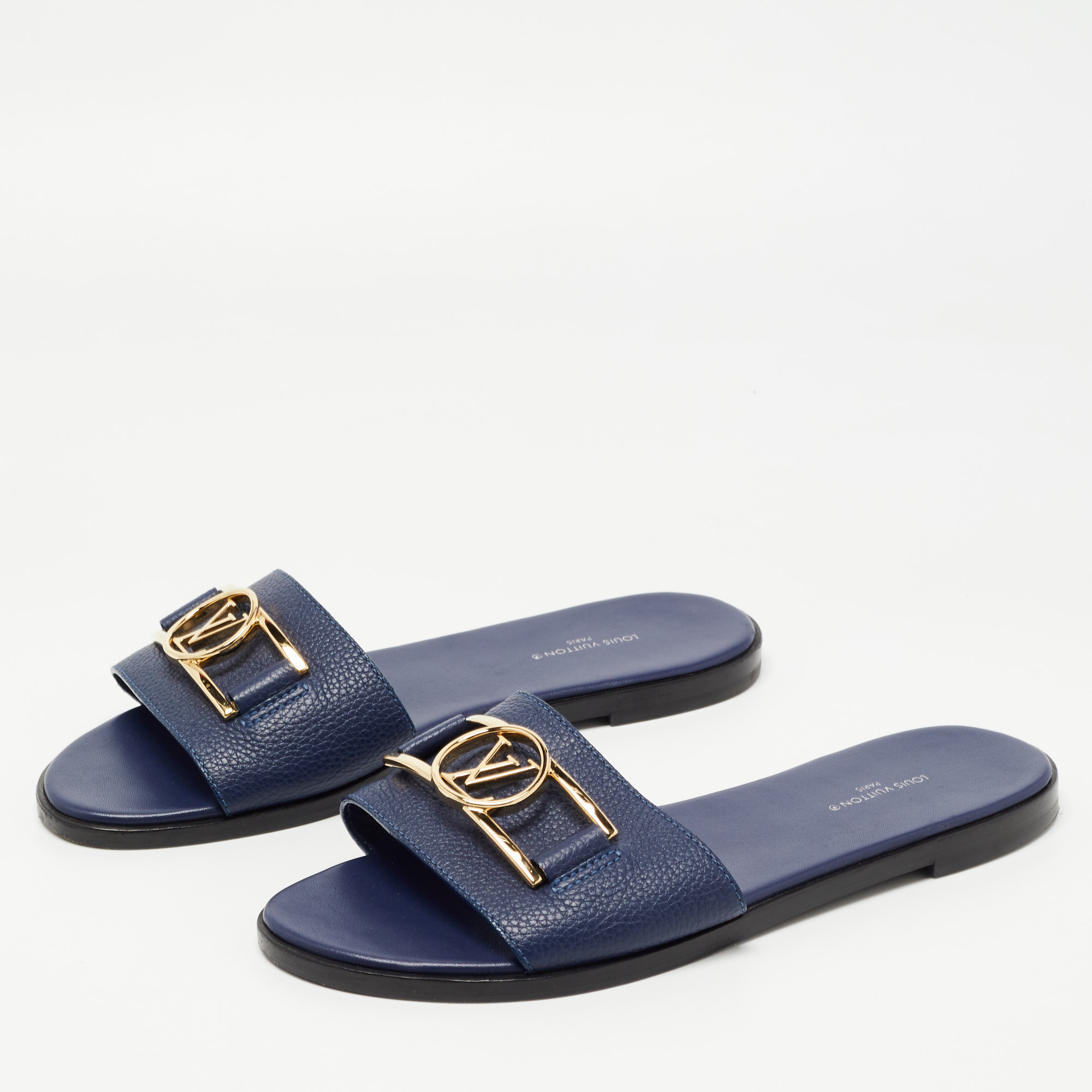 

Louis Vuitton Navy Blue Leather Lock It Flat Slides Size