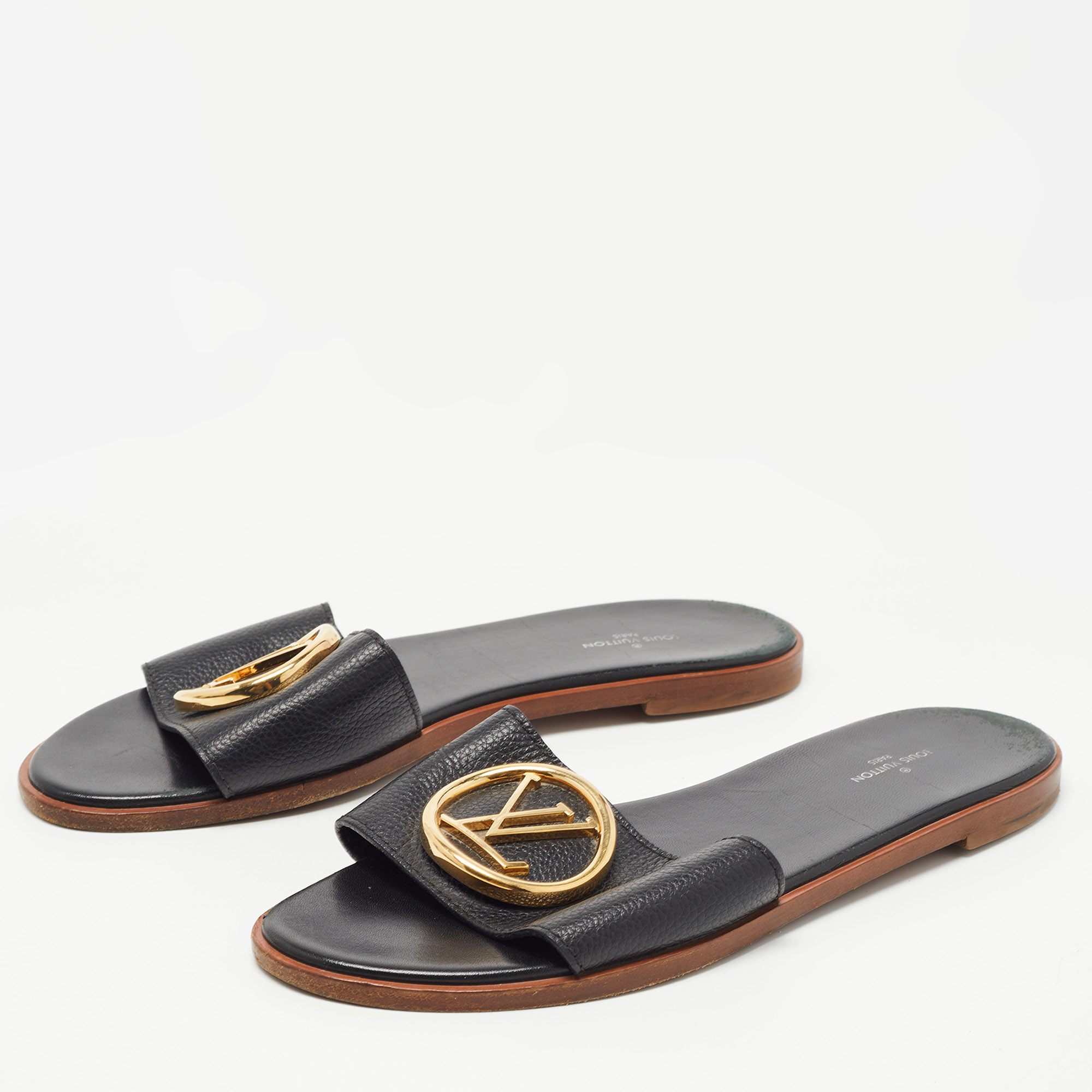 

Louis Vuitton Black Leather Lock It Flat Slides Size