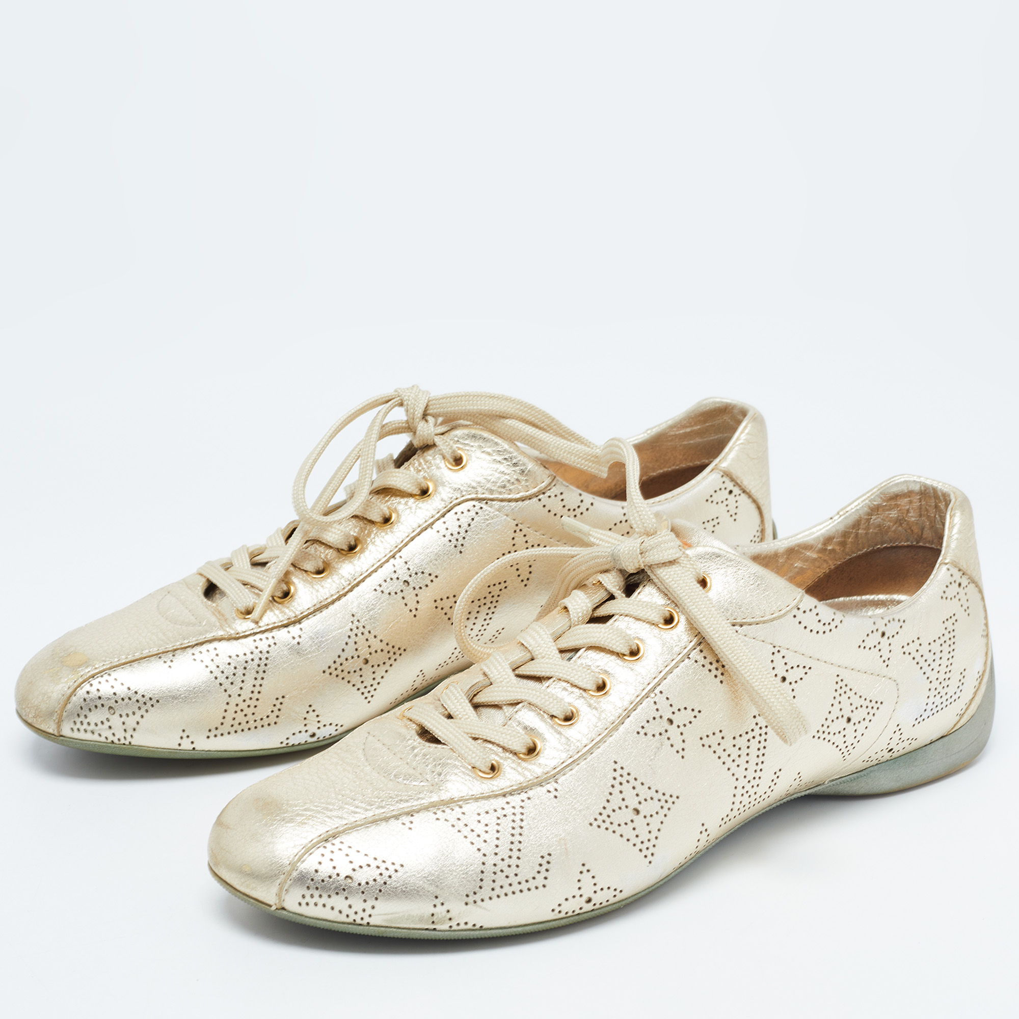 

Louis Vuitton Metallic Gold Mahina Leather Trainer Sneakers Size