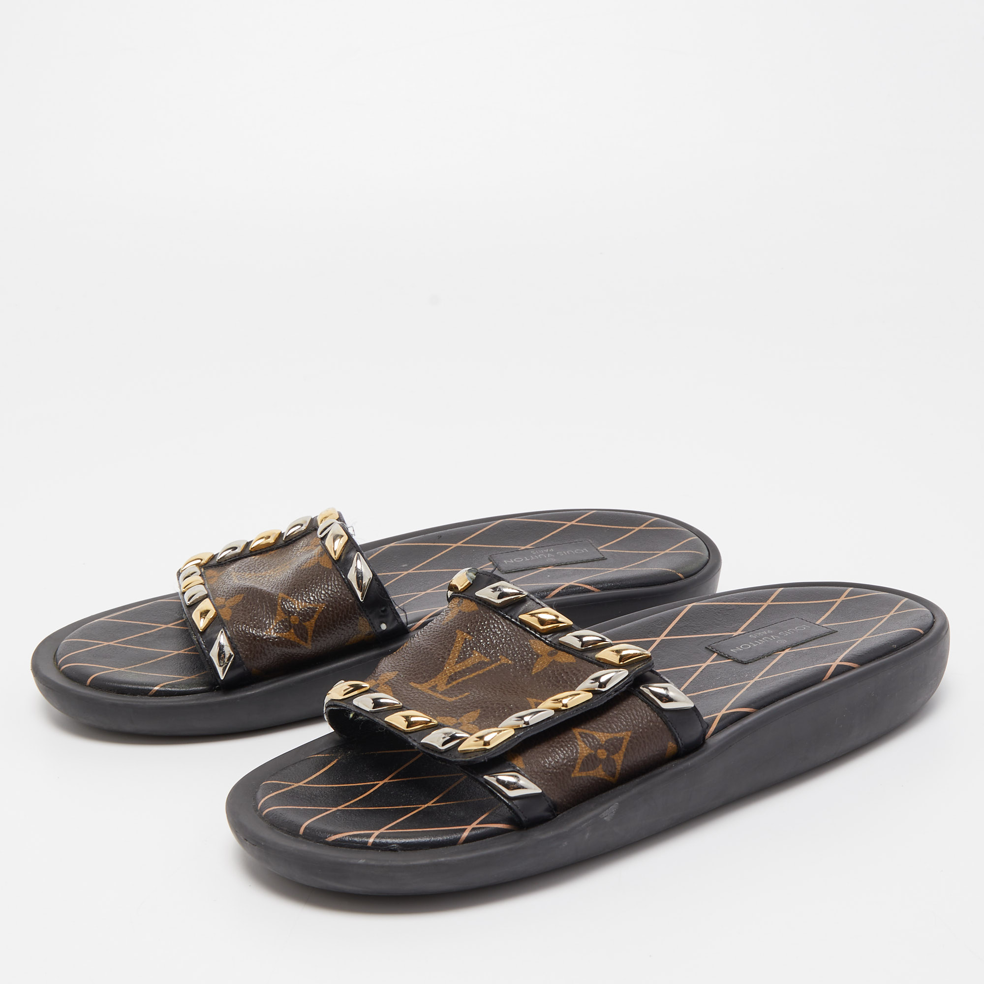 

Louis Vuitton Monogram Canvas and Studded Leather Eldorado Slides Size, Black