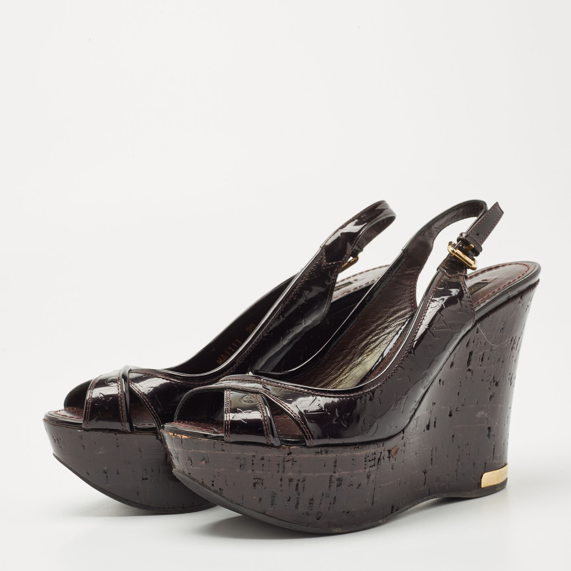 

Louis Vuitton Black Patent Leather Pantheon Wedge Slingback Sandals Size