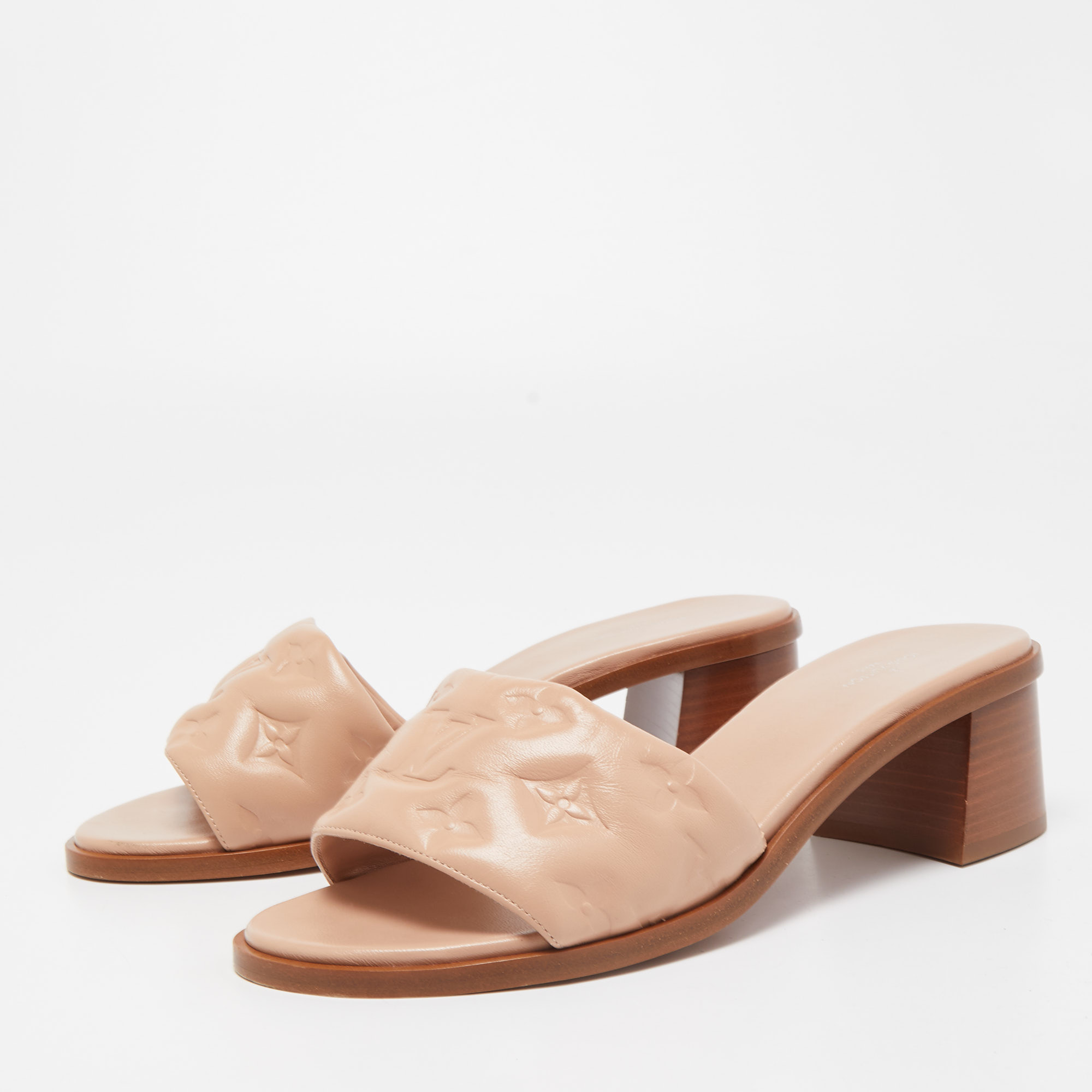

Louis Vuitton Light Pink Monogram Embossed Leather Revival Slide Sandals Size