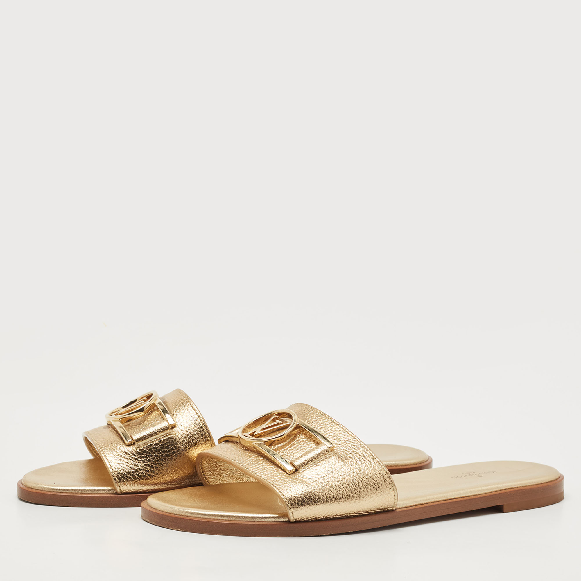 

Louis Vuitton Gold Foil Leather Flat Slides Size