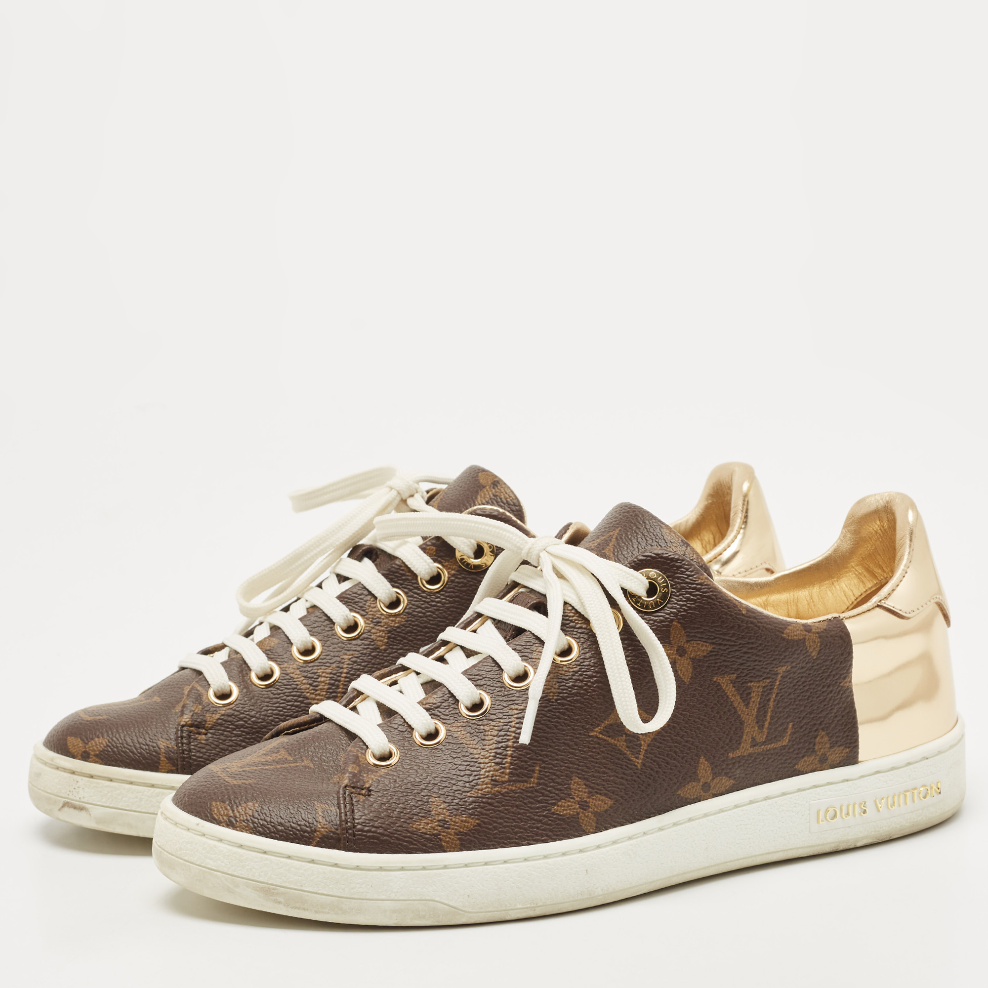 

Louis Vuitton Gold Coated Canvas and Patent Leather Frontrow Sneakers Size