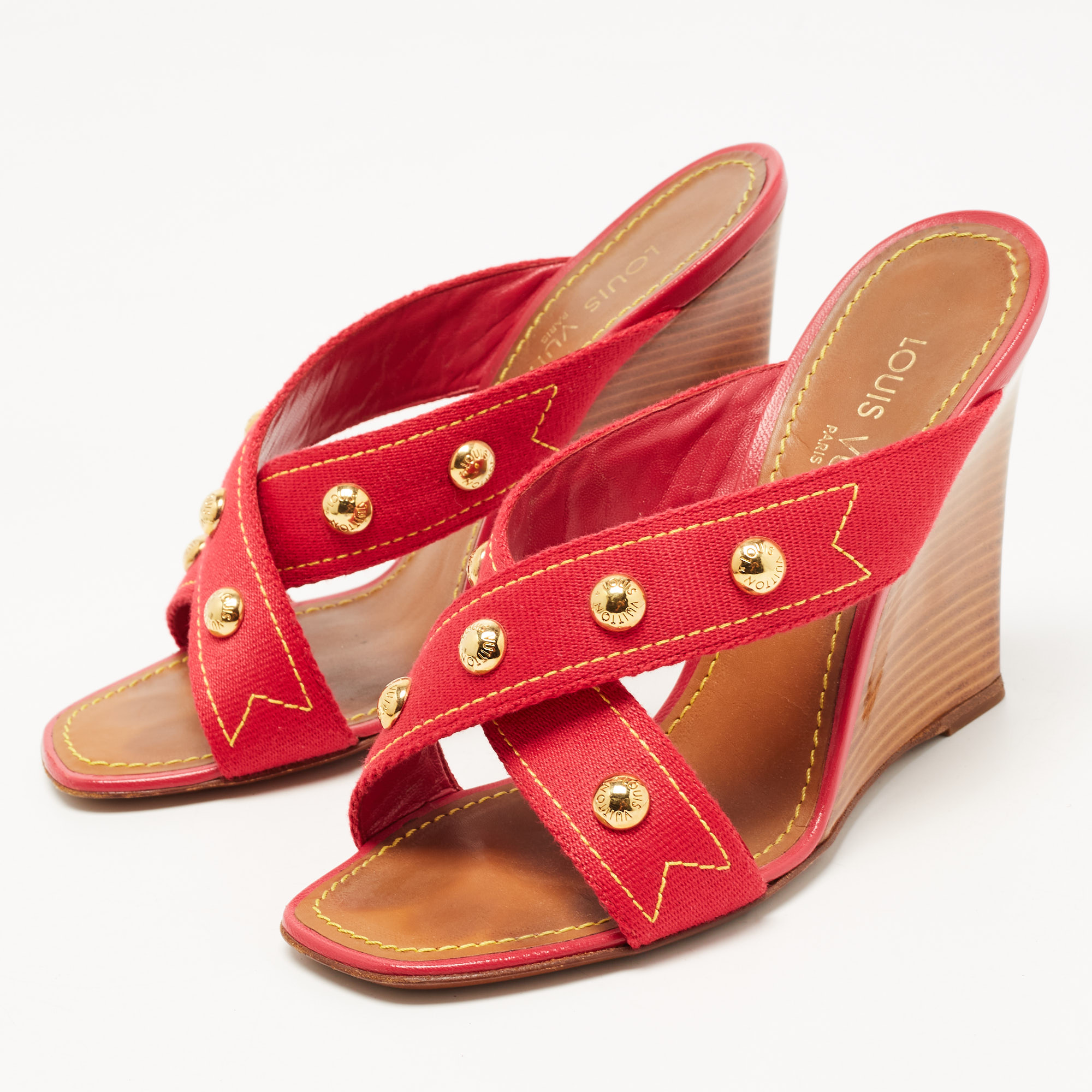 

Louis Vuitton Red Canvas Studded Crosscross Strap Wedge Sandals Size