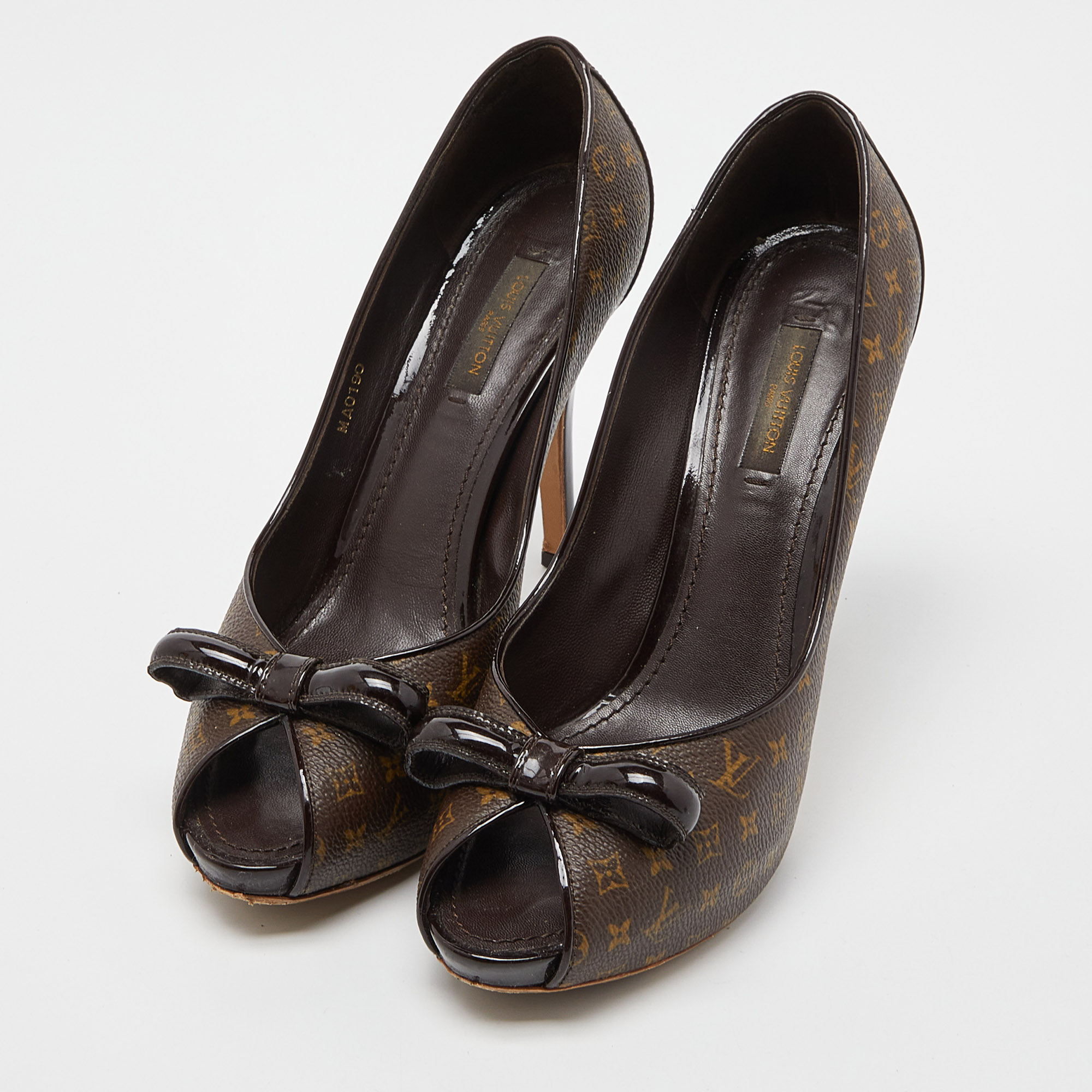 

Louis Vuitton Ebene Monogram Canvas and Patent Leather Bow Peep Toe Pumps Size, Brown