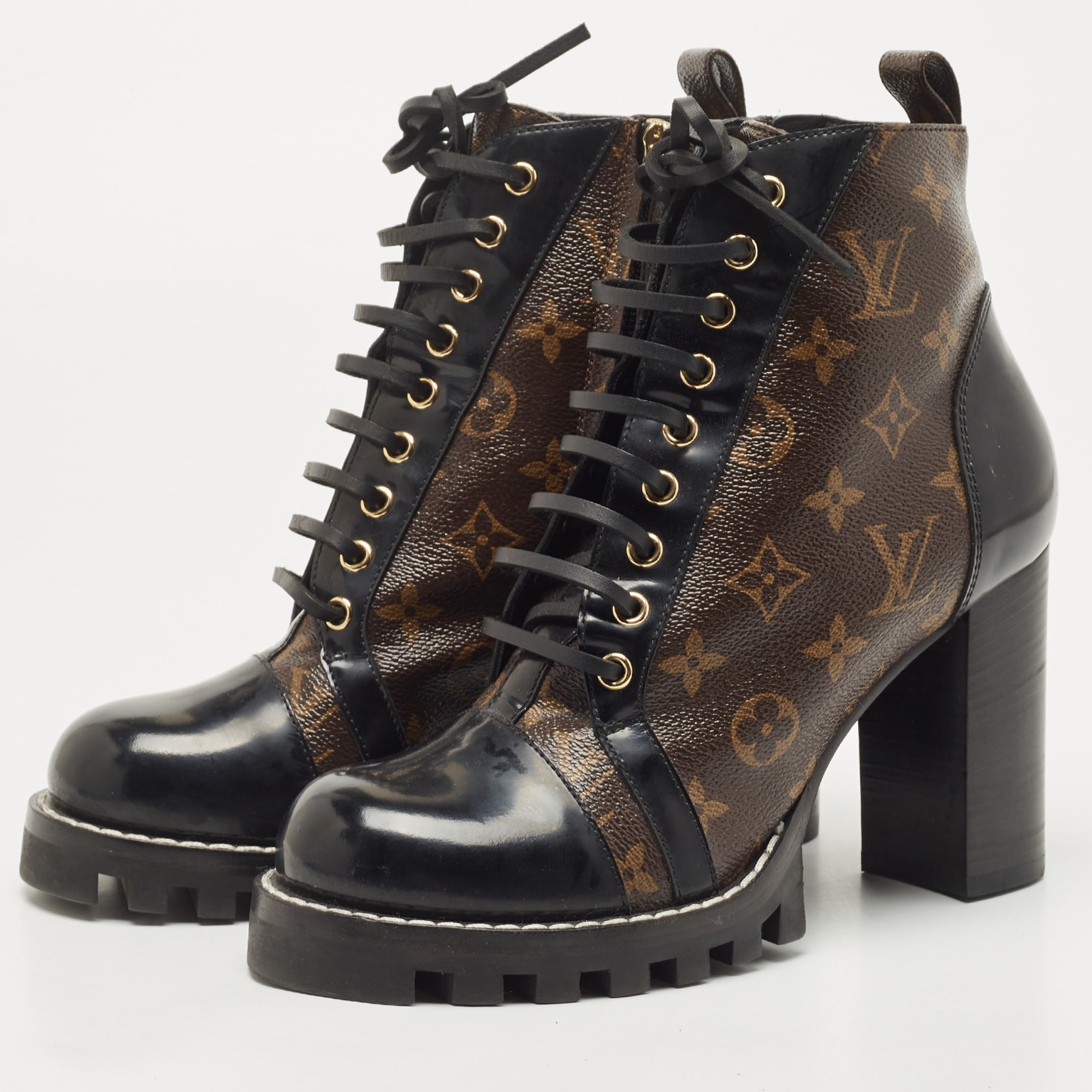 

Louis Vuitton Black/Brown Leather and Monogram Canvas Star Trail Ankle Boots Size