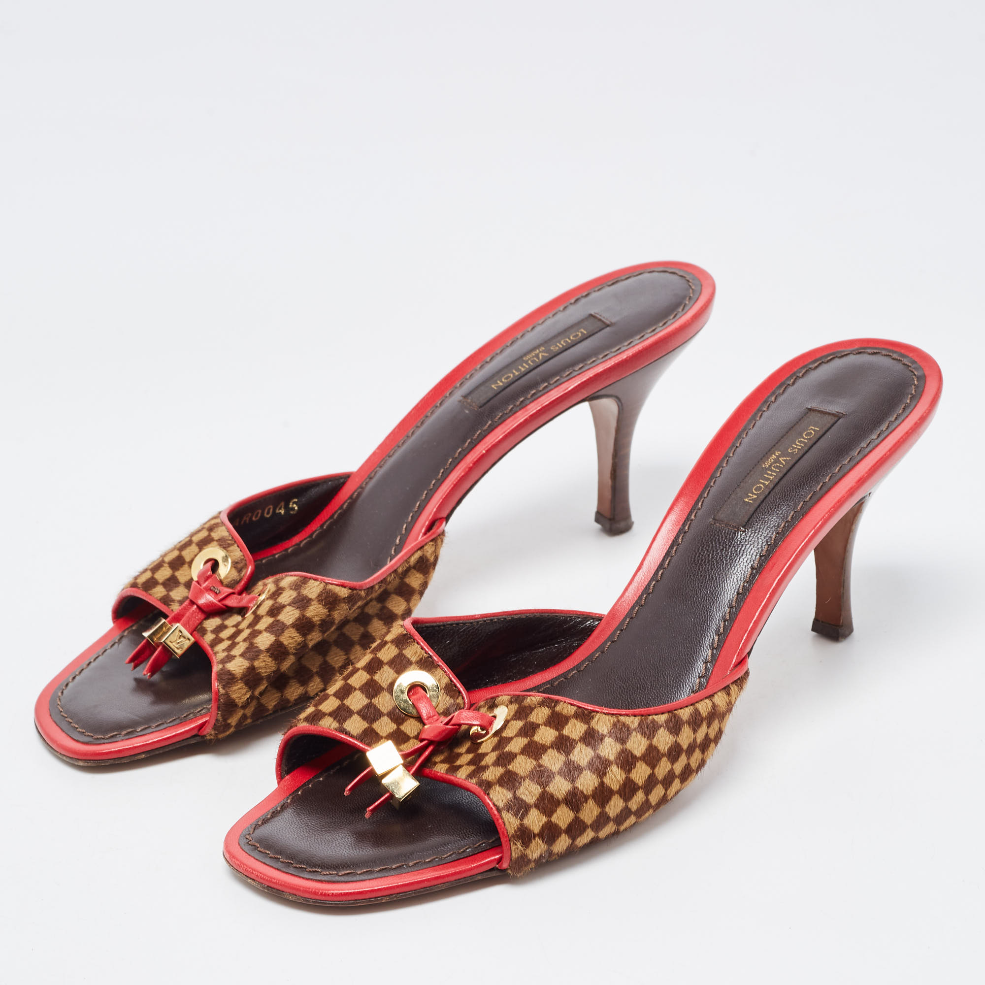 

Louis Vuitton Tricolor Damier Calf Hair Bow Slide Sandals Size, Brown