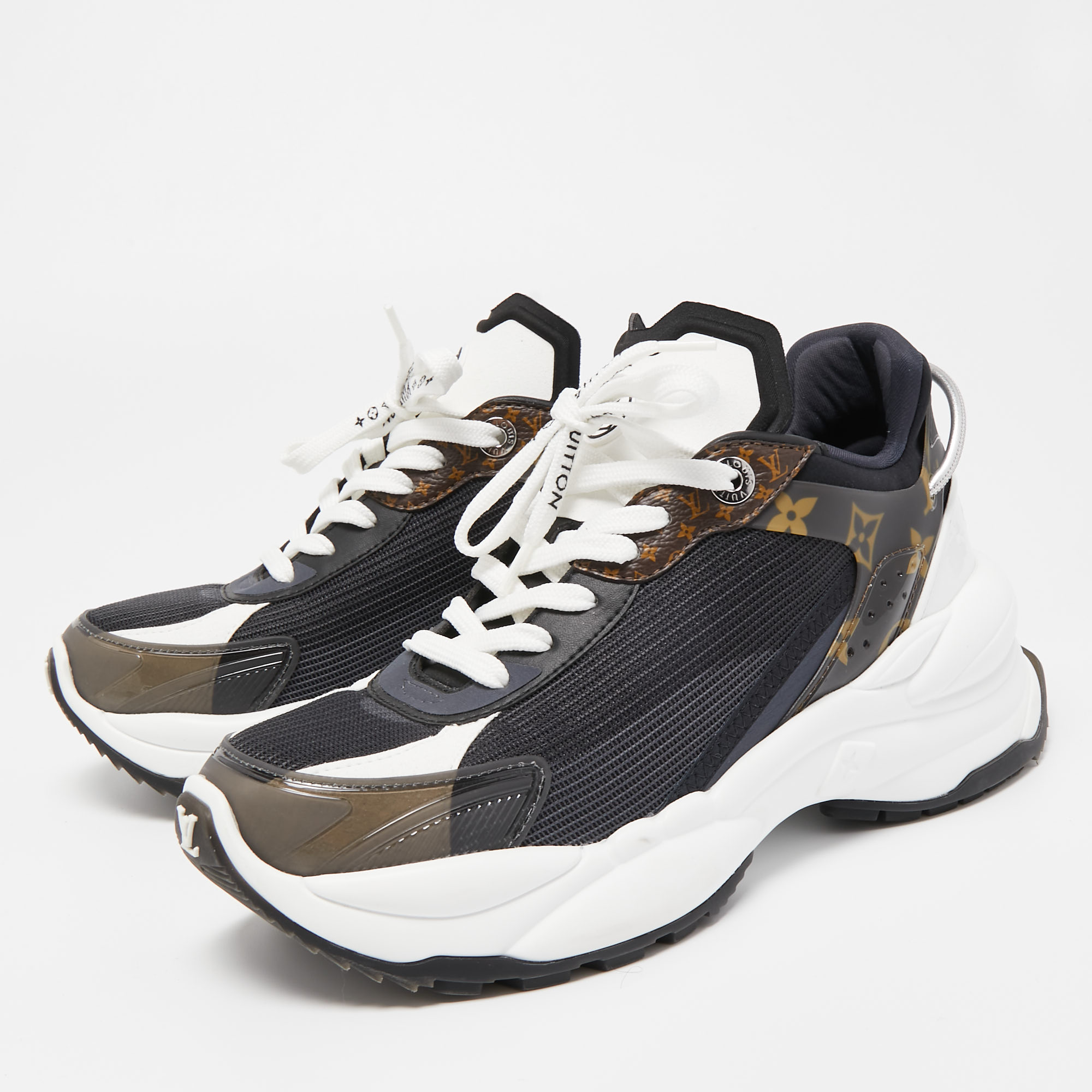

Louis Vuitton Tricolor Mesh and PVC Low Top Sneakers Size, Multicolor