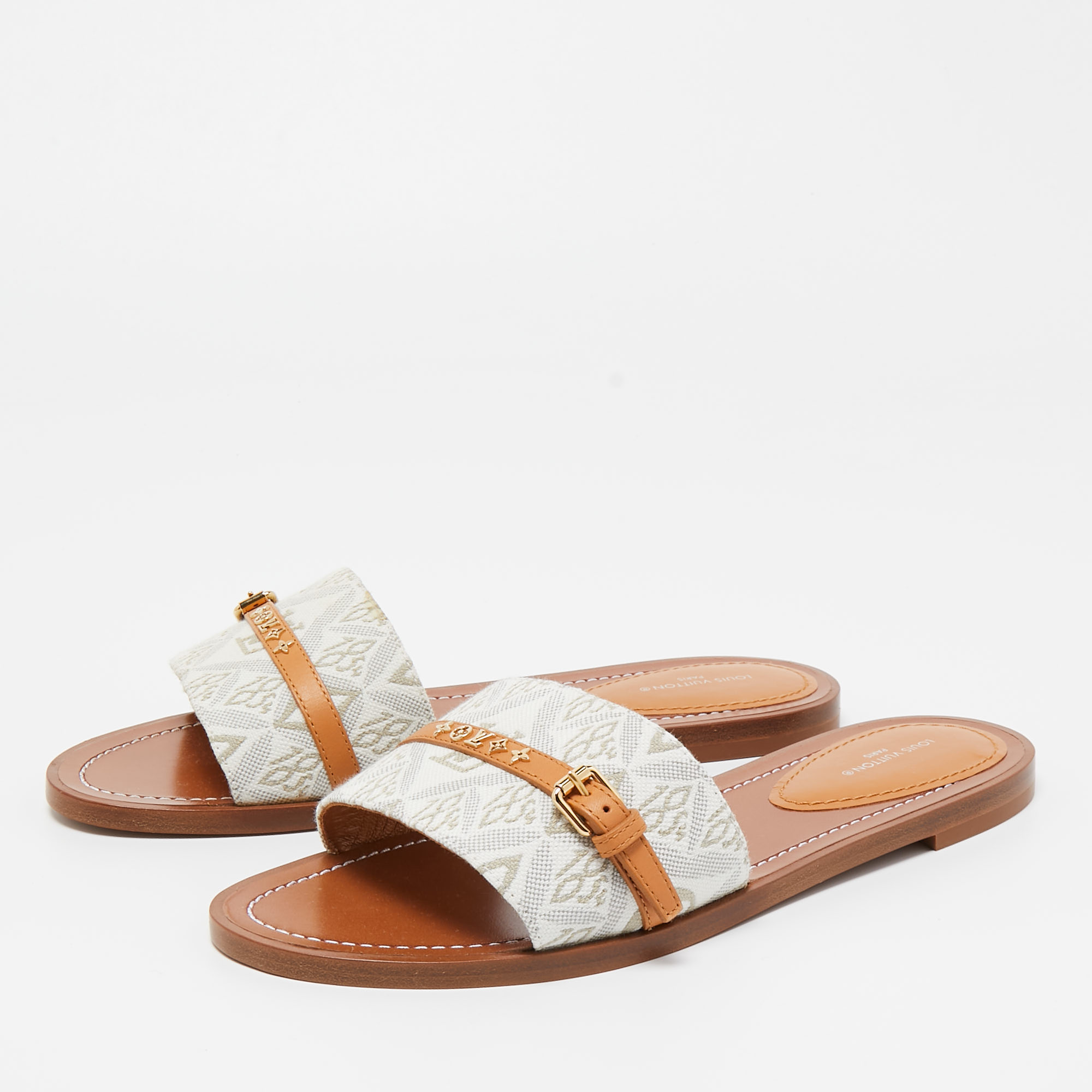 

Louis Vuitton White Canvas And Leather Lock It Flat Slides Size