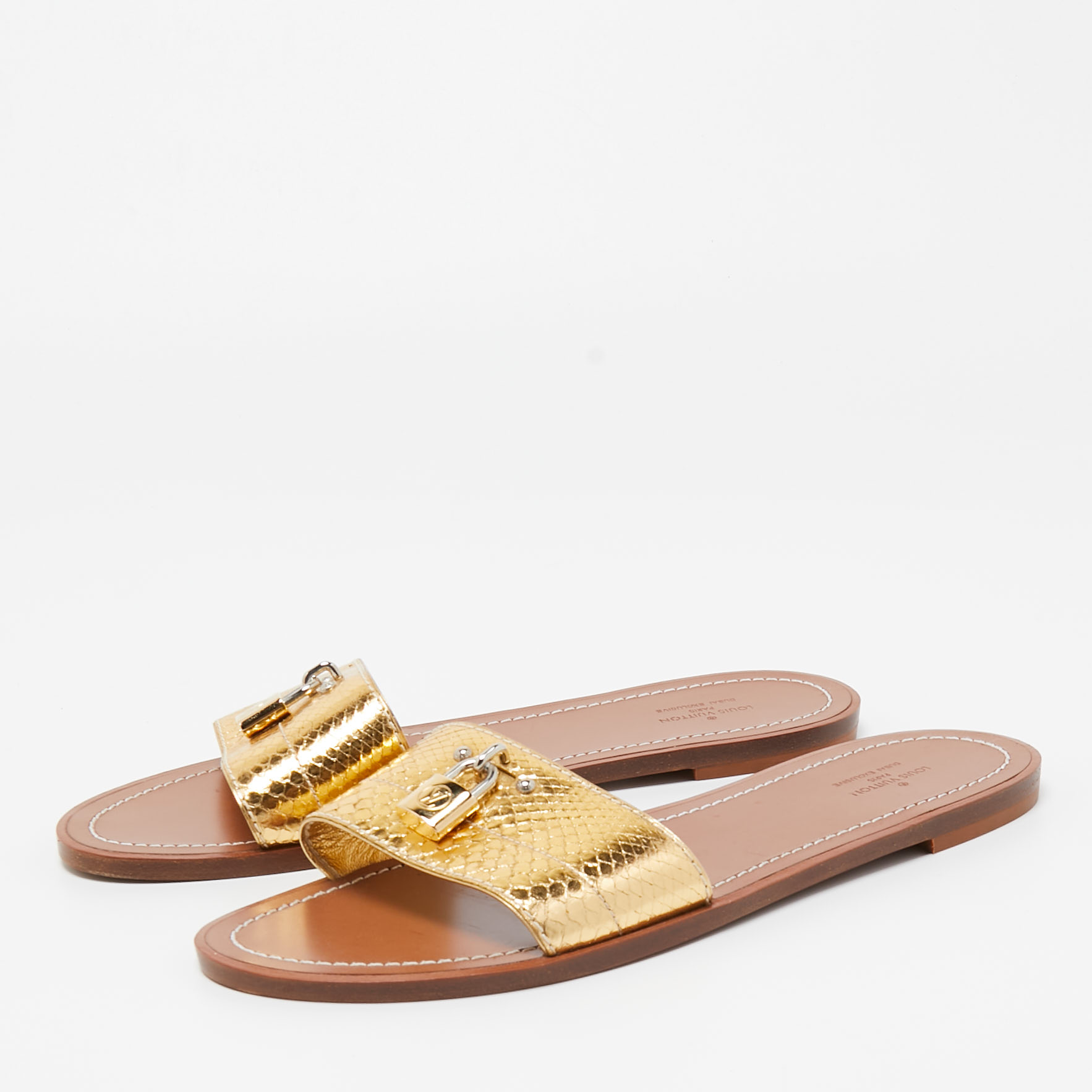 

Louis Vuitton Gold Python Embossed Leather Lock It Flat Slides Size