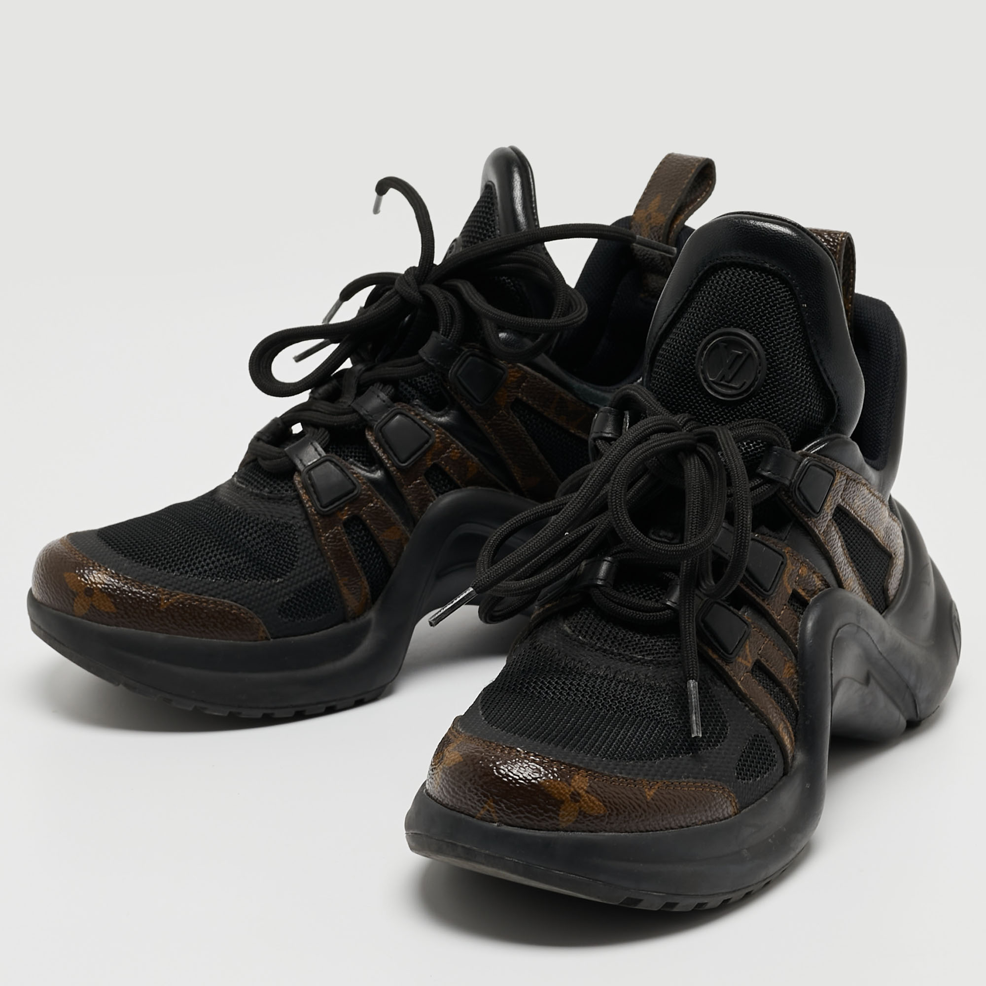 

Louis Vuitton Black/Brown Leather and Monogram Canvas Archlight Sneakers Size