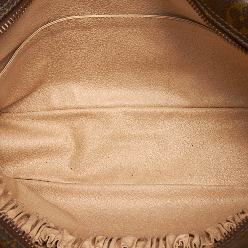 

Louis Vuitton Monogram Canvas Trousse Toilette 28, Brown
