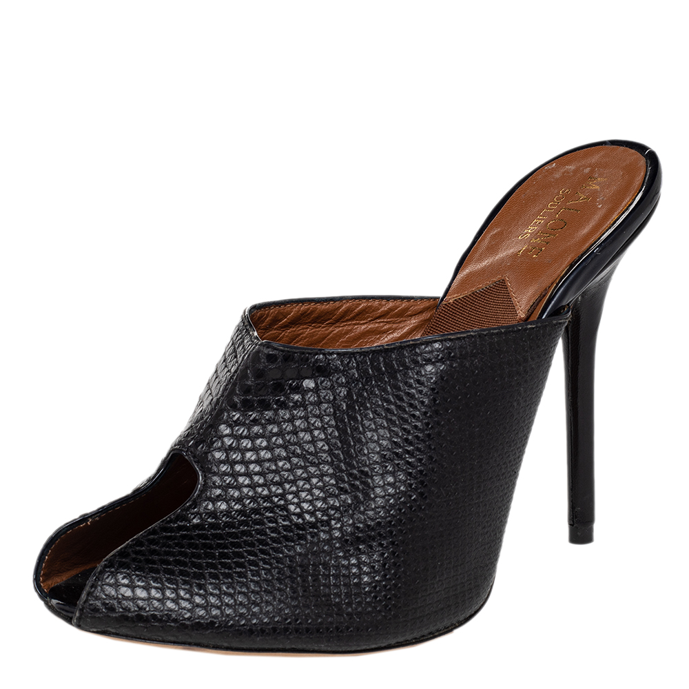 These mules from Malone Souliers look absolutely stunning in classic black. The sandals are crafted from snakeskin embossed leather and designed with peep toes and 11 cm heels. Theyll look great on your feet.