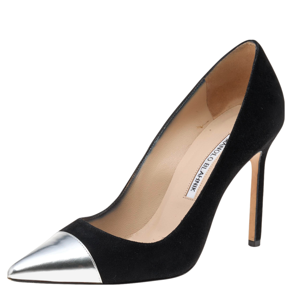 Chase your troubles away by wearing this pair of great pumps which have been created from suede and leather. They come with pointed toe tips and 10 cm heels. Attract all the attention around you while walking about in this pair of classy pumps by Manolo Blahnik.