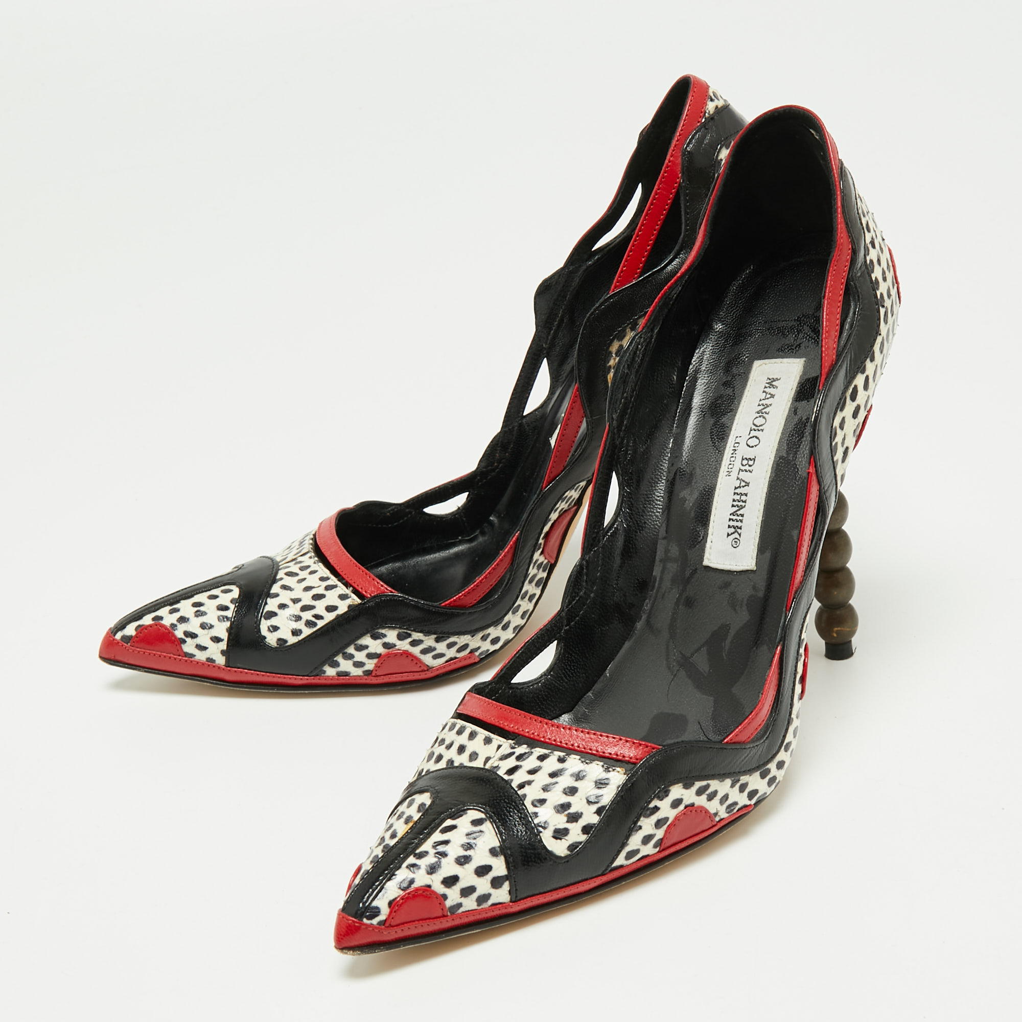 

Manolo Blahnik Multicolor Python And Leather Pointed Toe Pumps Size