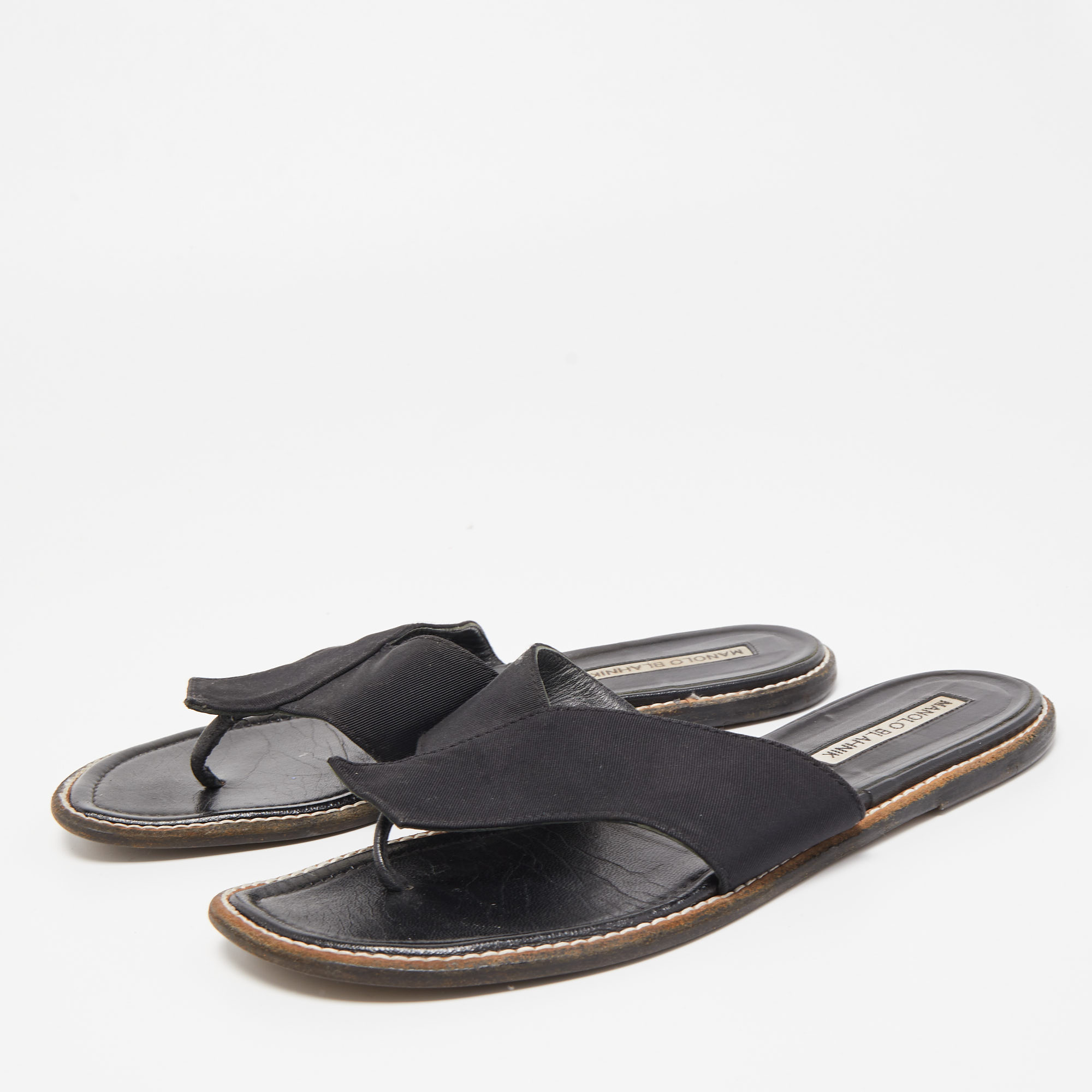 

Manolo Blahnik Black Canvas Thong Flats Size